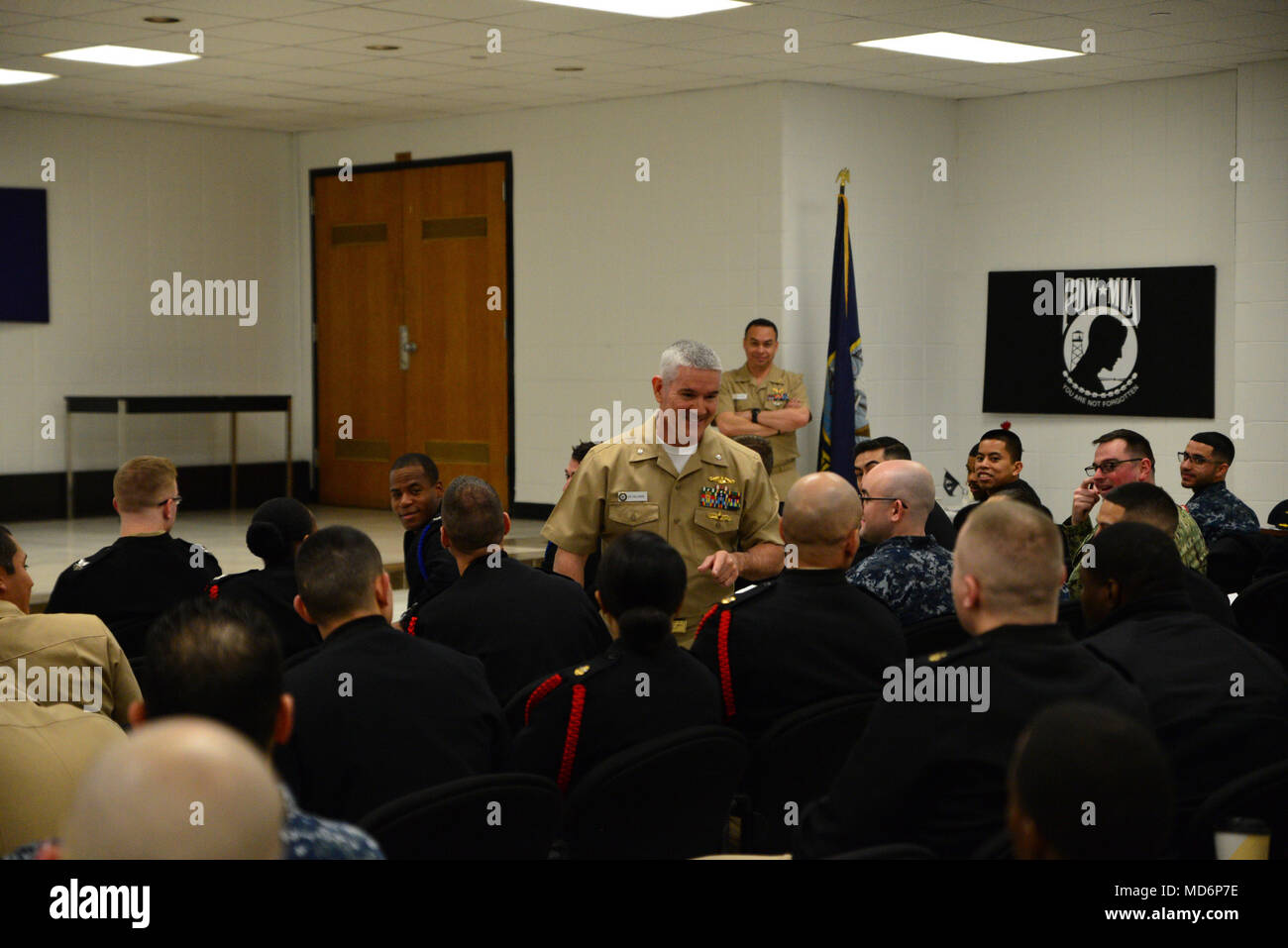 180330-N-BN978-015 GREAT LAKES, Ill (March 30, 2018) Cmdr. Ed Callahan, Limited Duty Officer (LDO)/Chief Warrant Officer (CWO) community manager at Bureau of Naval Personnel, addressed over 100 Sailors from all area commands highlighting opportunities in career advancements within the LDO/CWO community March 30. Surface Warfare Officers School Unit Great Lakes hosted the event that discussed prerequisites, mentors, application process and selection board procedures. (U.S. Navy photo by Brian Walsh/Released) Stock Photo