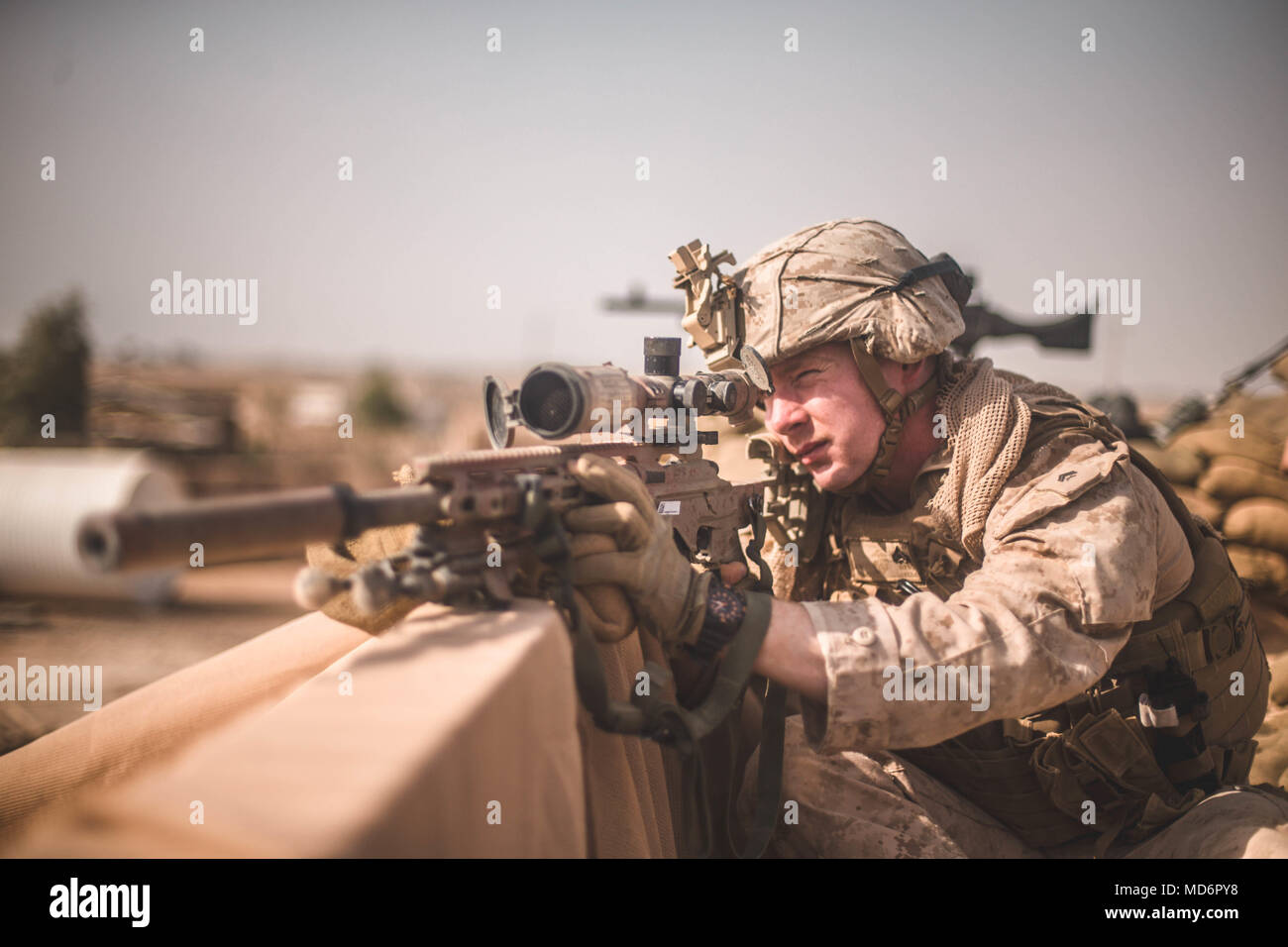 A U.S. Marine Corps sniper with Task Force Southwest (TFSW) stands ...