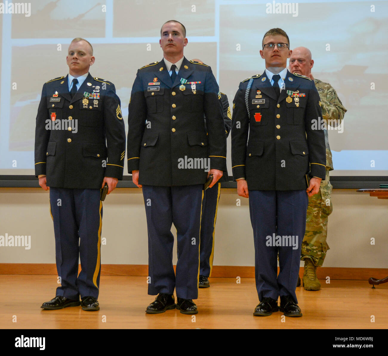 From left to right are Staff Sgt. Daniel Ondrusek, a field artillery