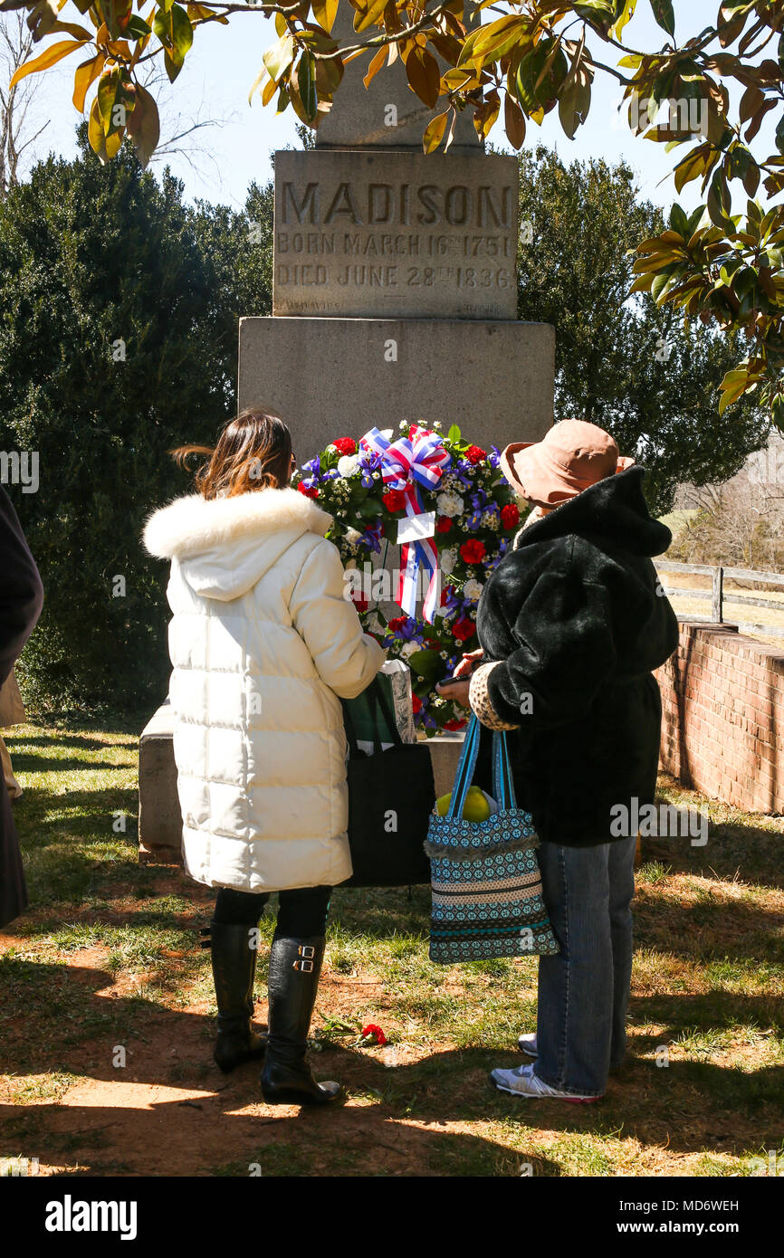 Guests view the Presidential wreath at the tomb of the 4th President of the United States, James Madison, also known as the Father of the Constitution, at his home at Montpelier, Orange, Va., March 16, 2018. The wreath laying ceremony was held in commemoration of the 267th anniversary of the birth of Madison, born in 1751, and has also been decreed as James Madison Appreciation Day for the Commonwealth of Virginia. (U.S. Marine Corps photo by Lance Cpl. Paige M Verry) Stock Photo
