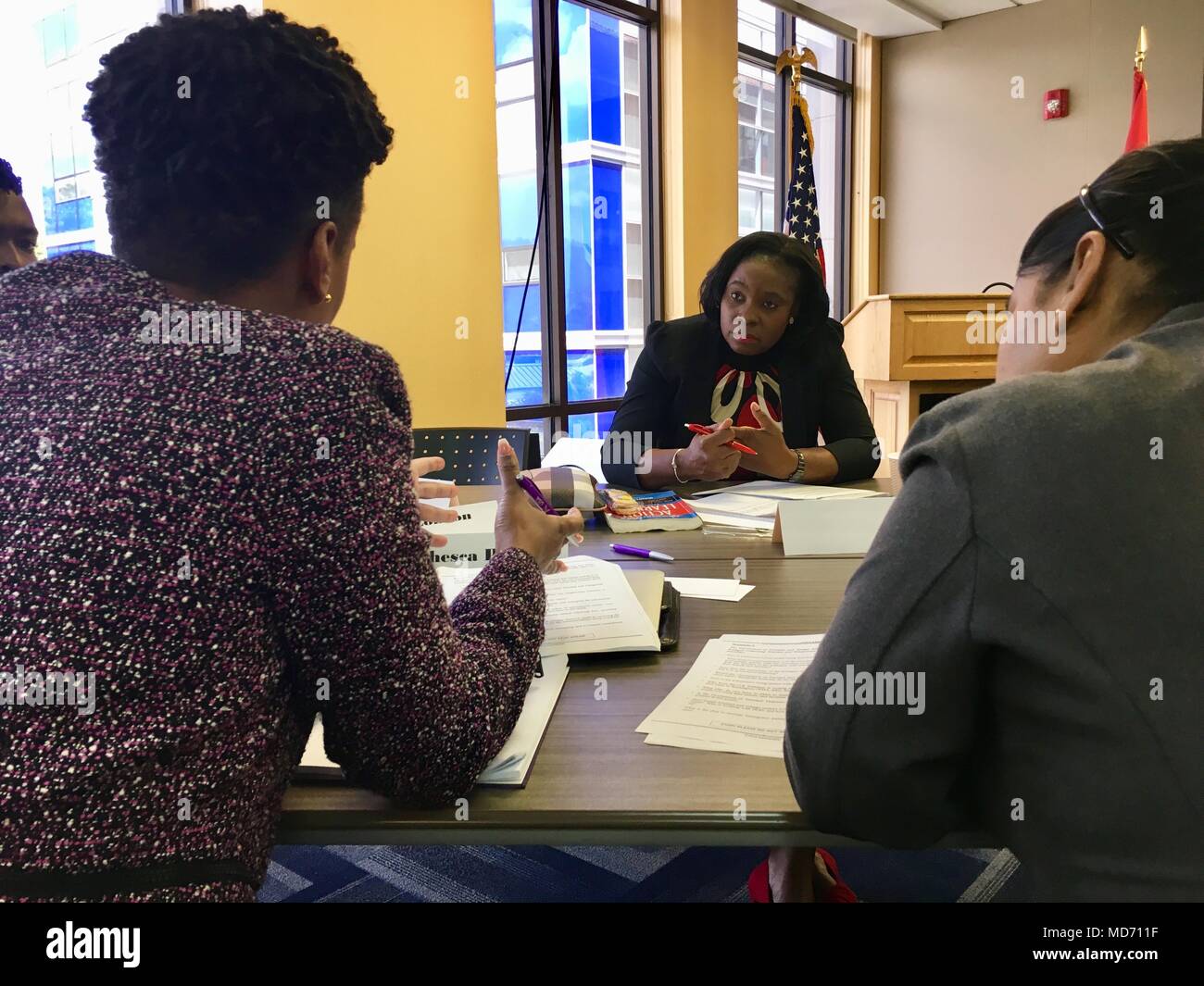 Natalie Walters (center), manager of corporate communications at the