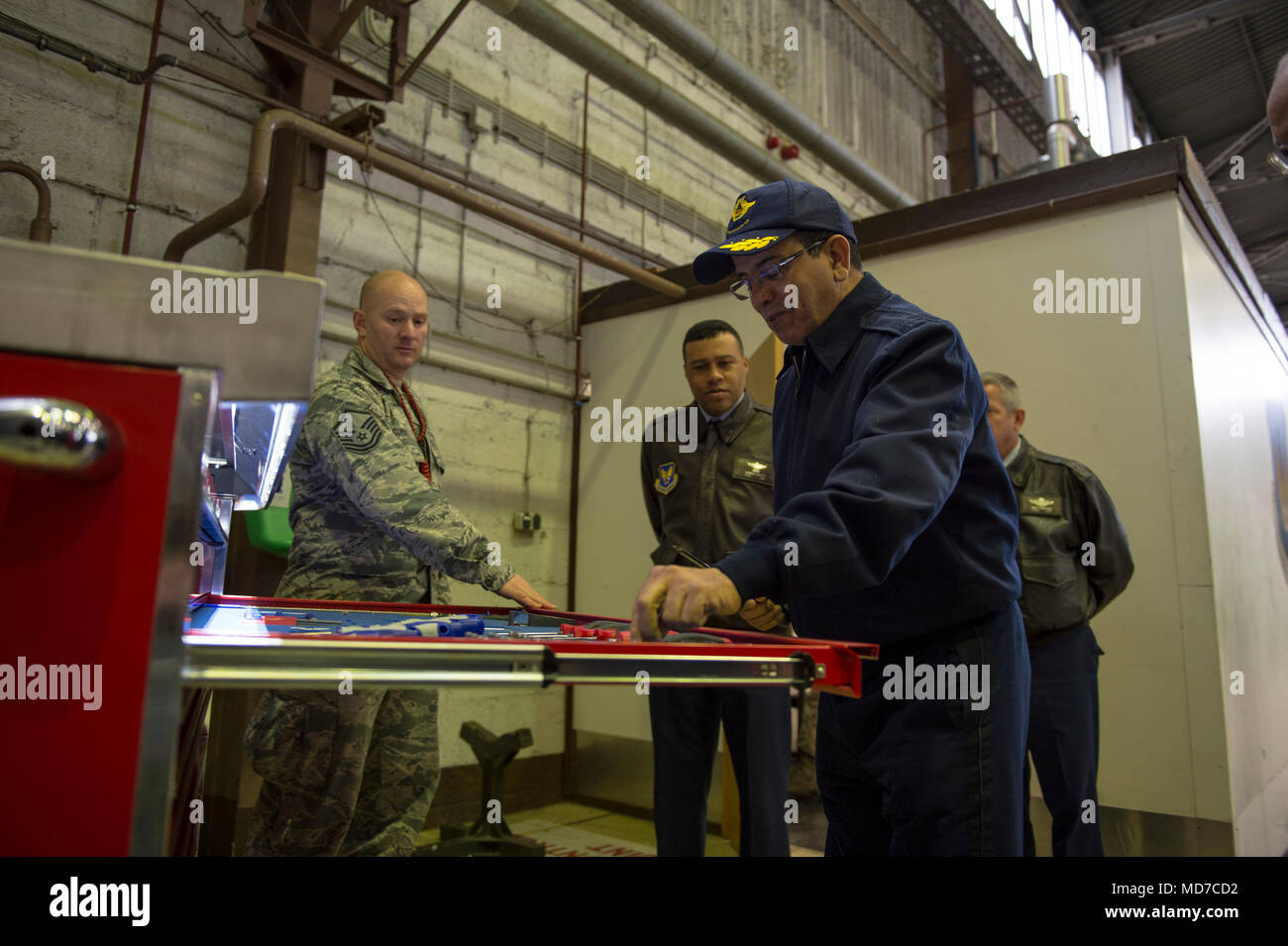Maj. Gen. Hassan Fakri, Royal Moroccan Air Force deputy inspector, examines an automated toolbox during a tour of Hangar 1 at Spangdahlem Air Base, Germany, March 28, 2018. The visit marked the first time the RMAF has visited the 52nd Fighter Wing, allowing for reinforcement in bilateral relationship as well as a means to identify future security cooperation priorities between the USAF and RMAF. (U.S. Air Force photo by Senior Airman Dawn M. Weber) Stock Photo