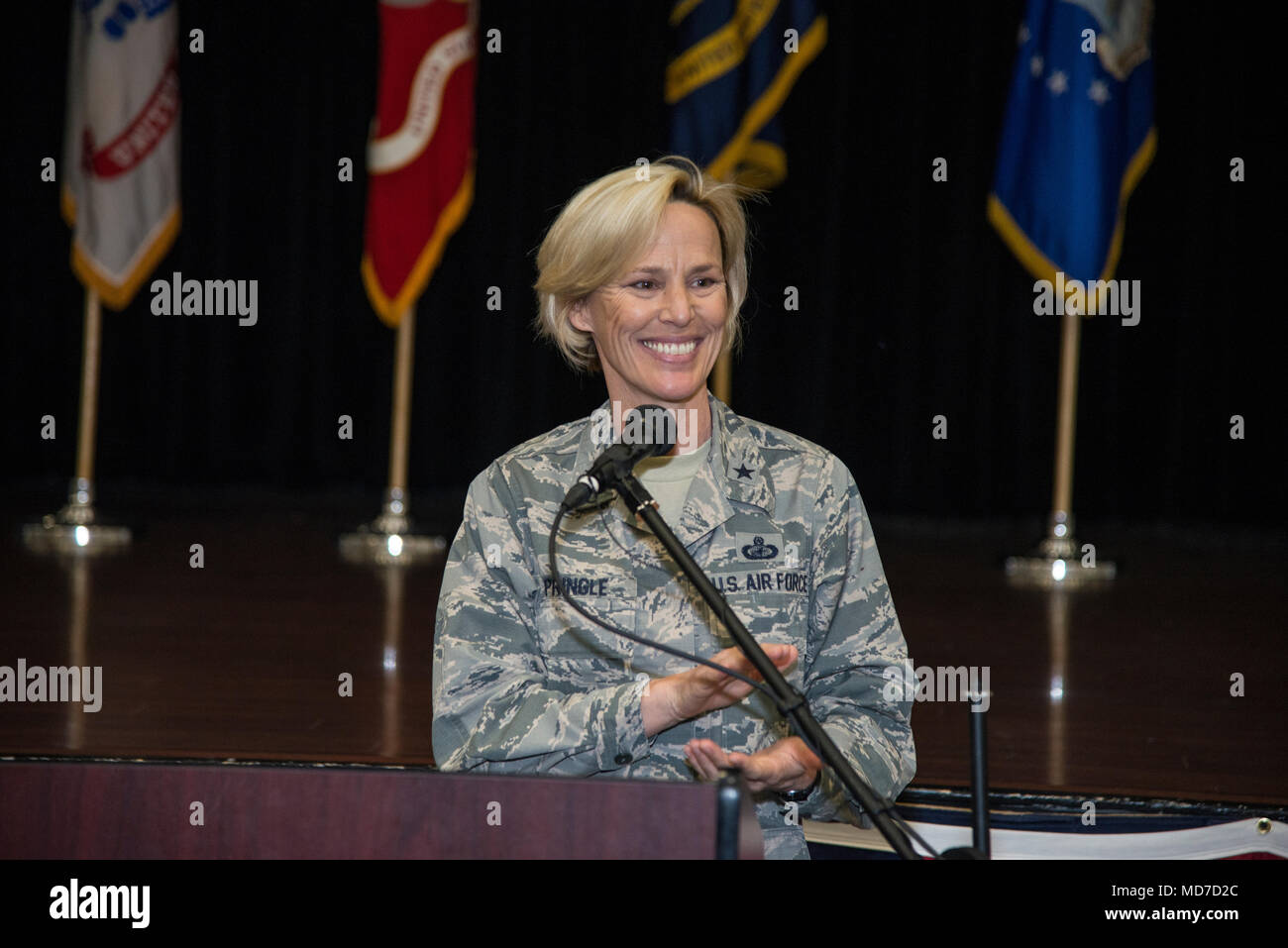 Brig. Gen. Heather Pringle, 502nd Air Base Wing and Joint Base San Antonio commander makes opening remarks about the importance of the new 19-week training course for in-demand careers, Joint Base San Antonio-Fort Sam Houston Military and Family Readiness Center, March 23.  The course is being provided by Microsoft Software and Systems Academy located at JBSA-Randolph.  Air Force photo by Michael L. Watkins, Jr. Stock Photo