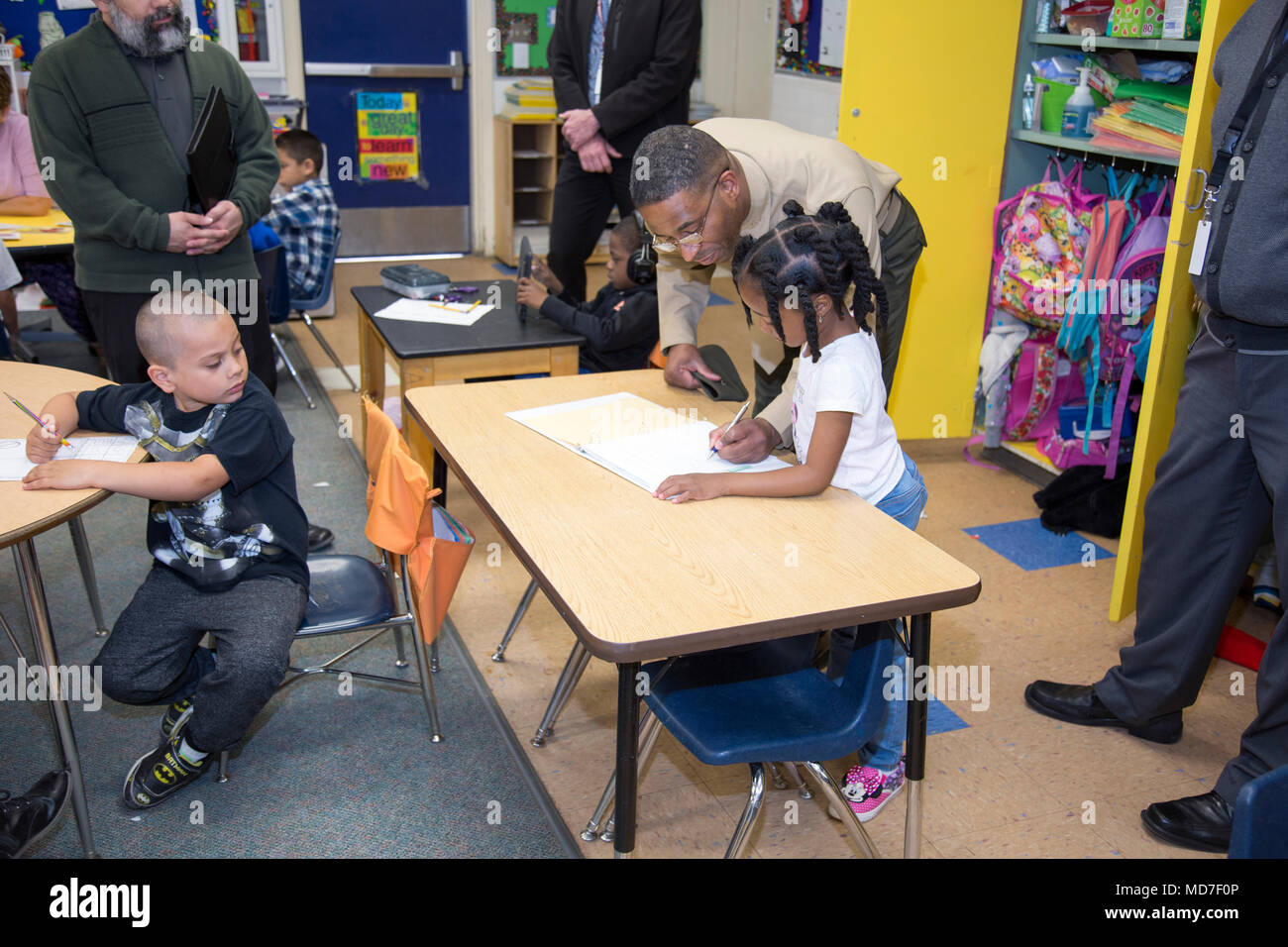 A student at Cameron Elementary School watches as Col. Sekou Karega