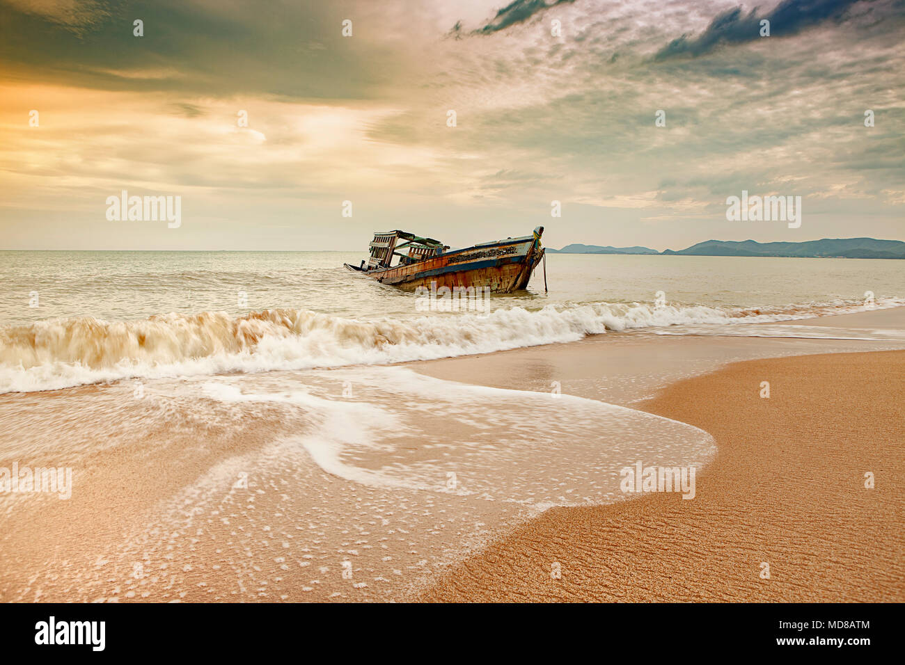 old wreck boat on abandoned sea beach Stock Photo - Alamy