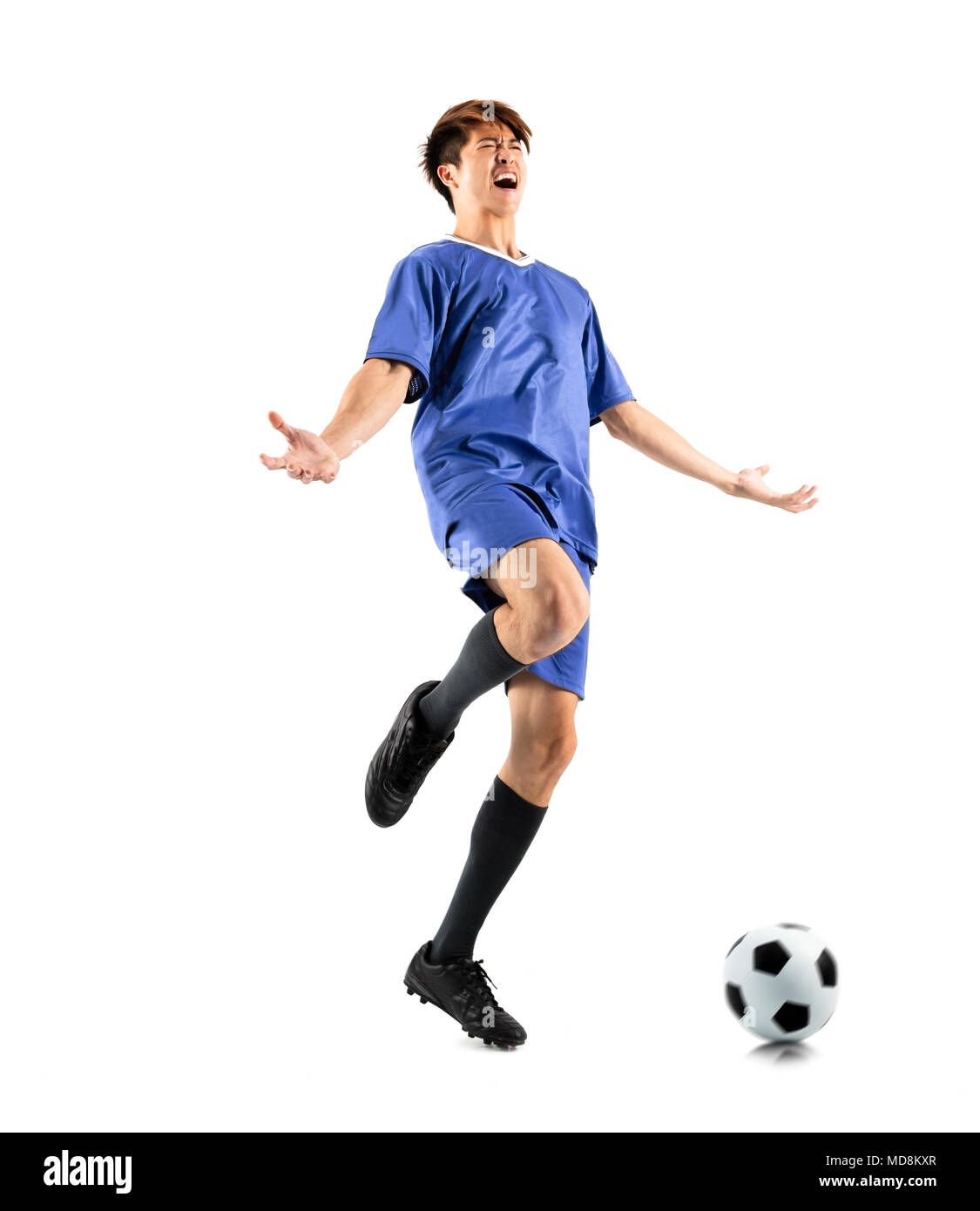 happy asian soccer player celebrating  isolated on white Stock Photo