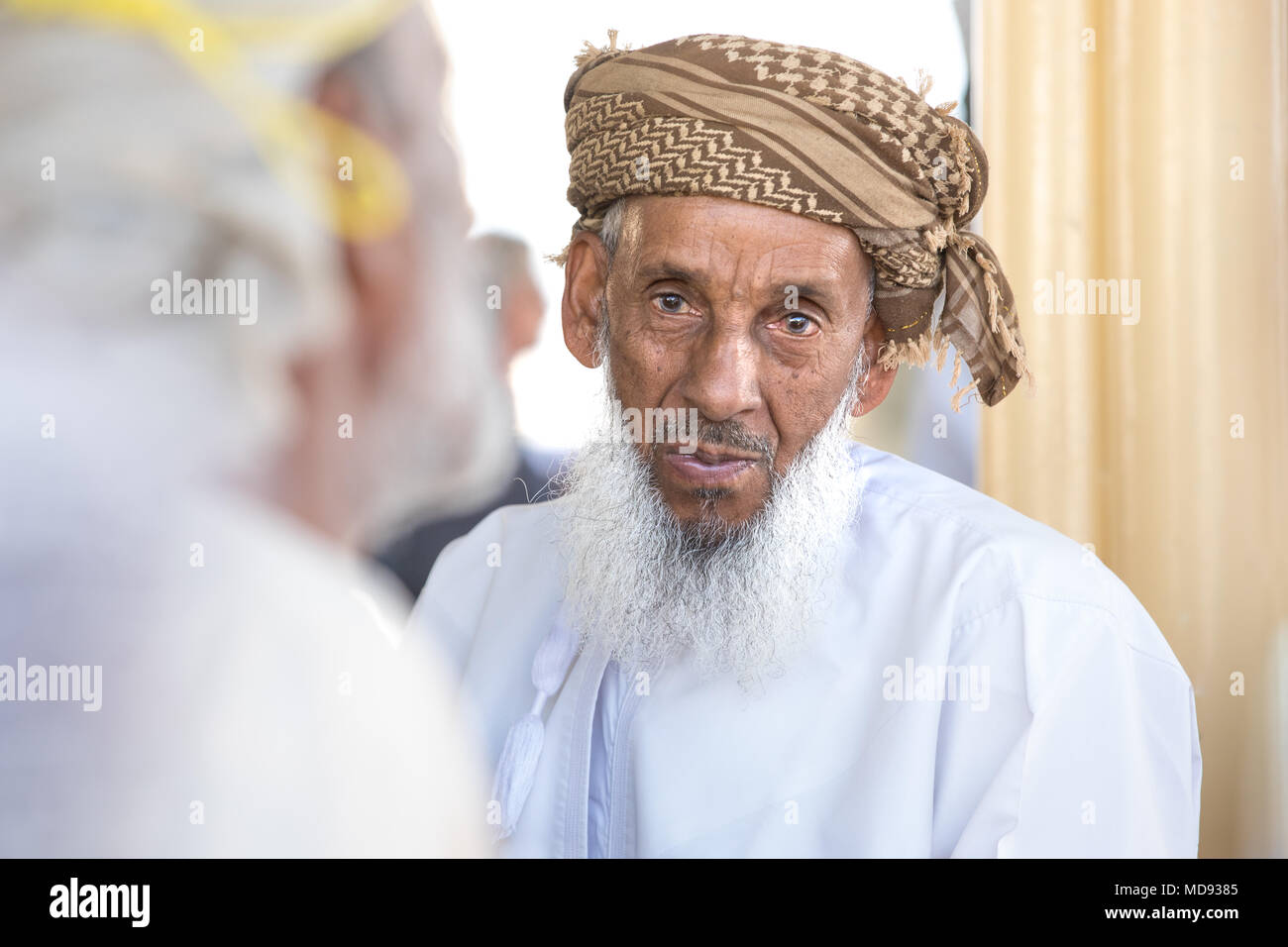 Omani man with a goat hi-res stock photography and images - Alamy