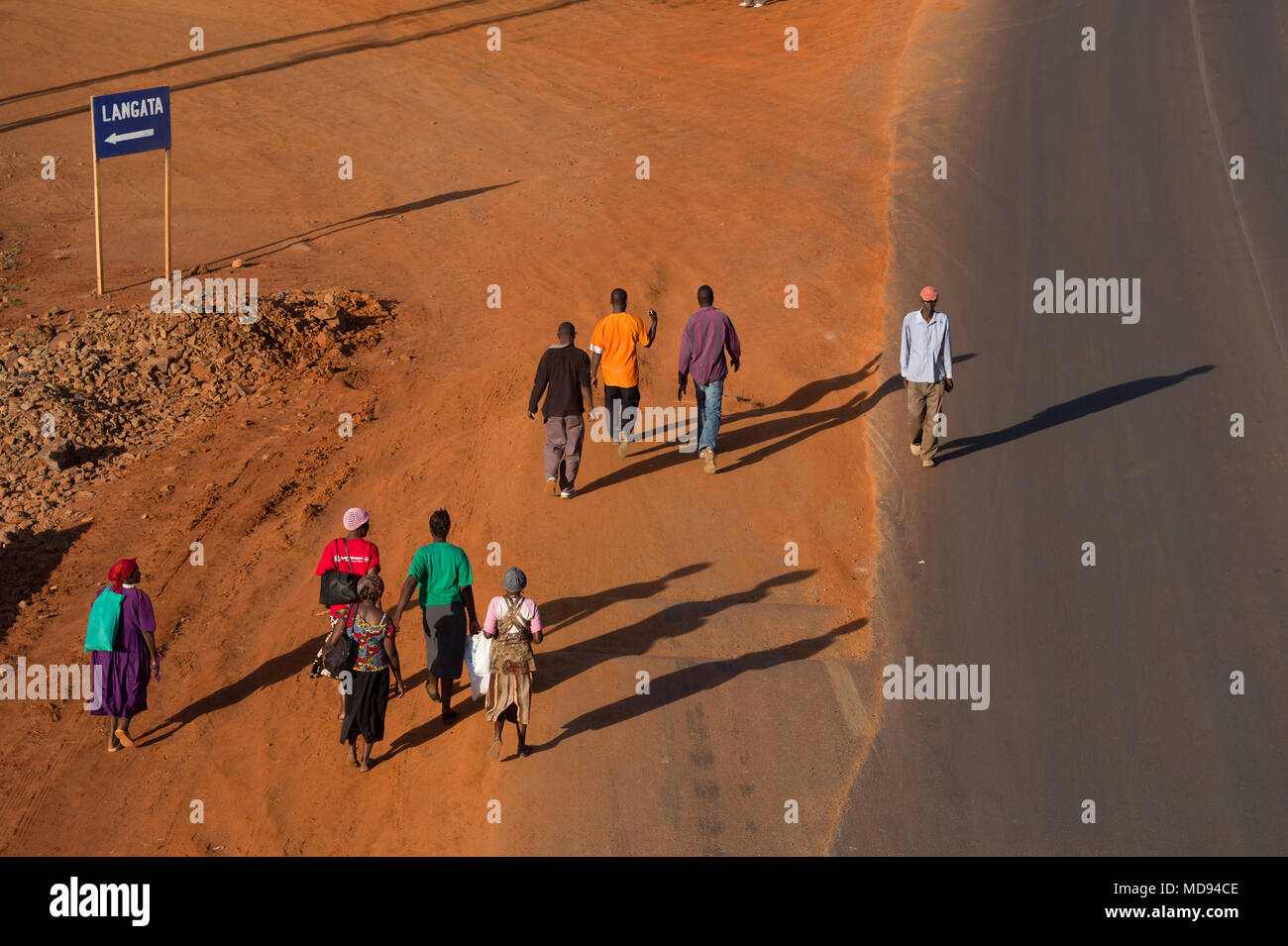 People walking along the newly widened Ngong Road at the juction of the