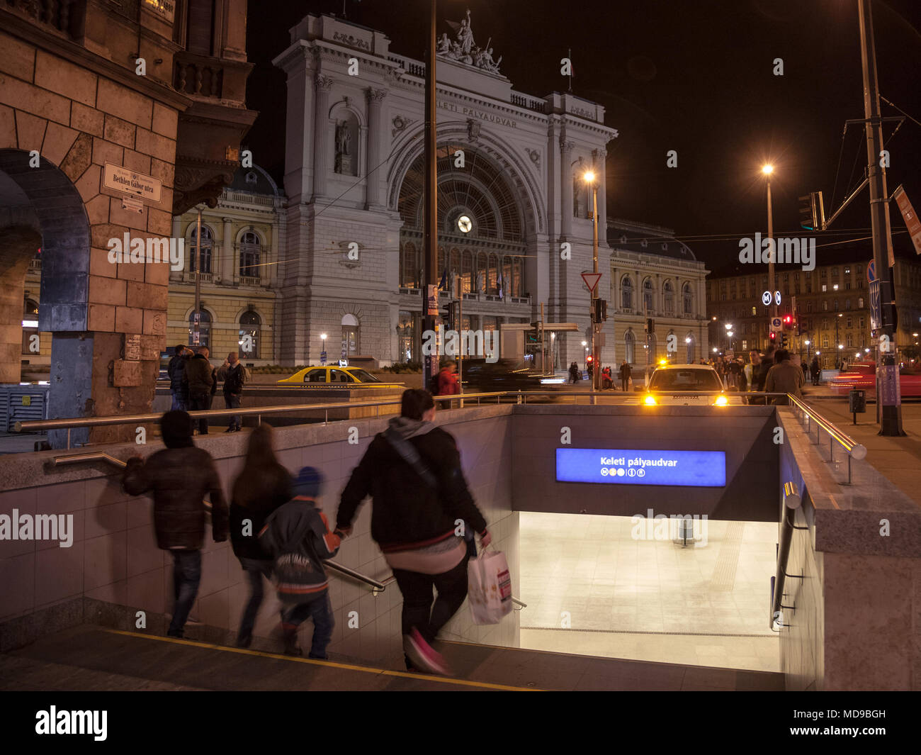 BUDAPEST, HUNGARY - APRIL 6, 2018: Family going down the stairs of a metro  Station in front of Budapest Keleti Palyaudvar train station at night Pict  Stock Photo - Alamy