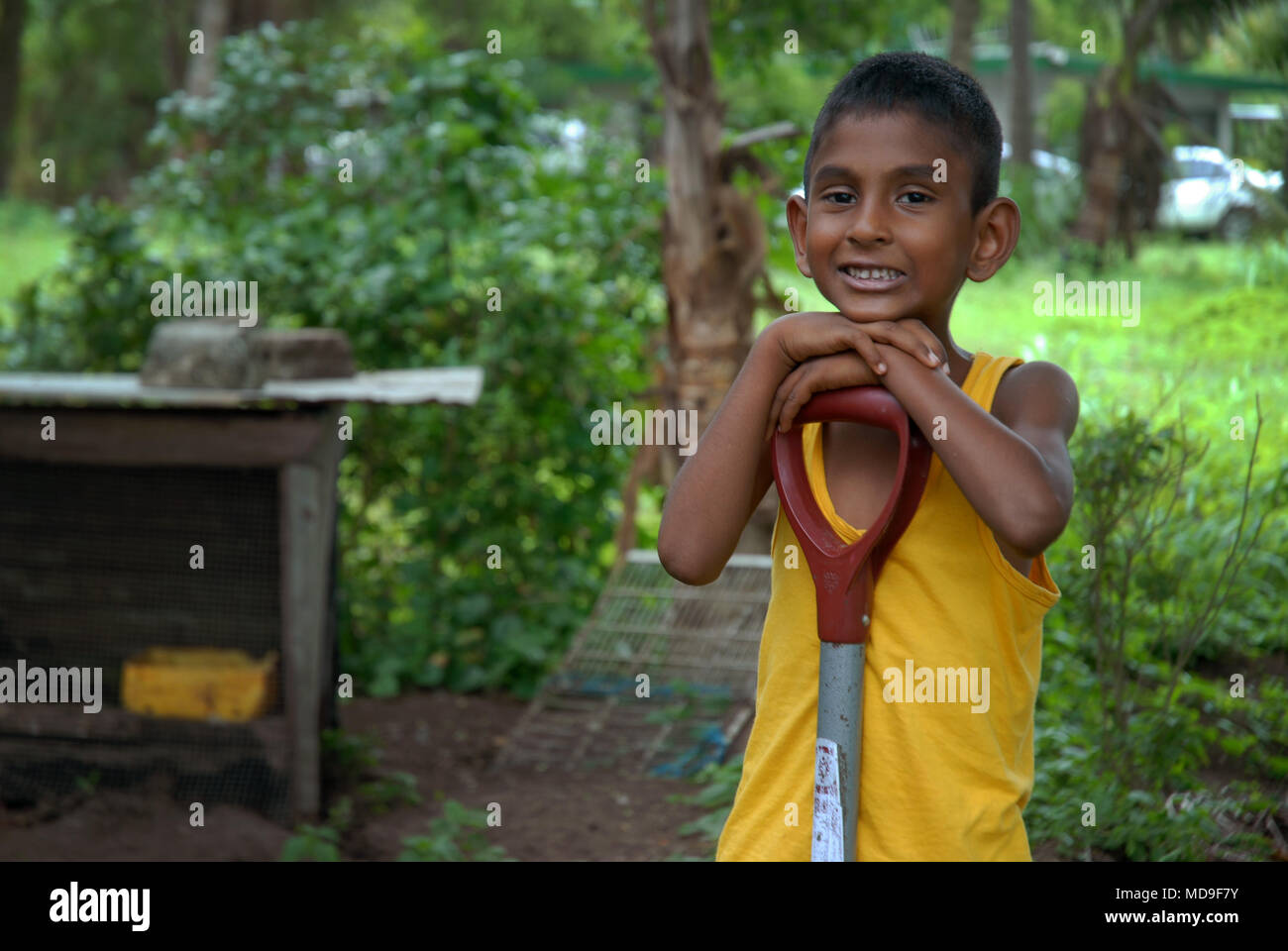 Kid with spade hi-res stock photography and images - Alamy