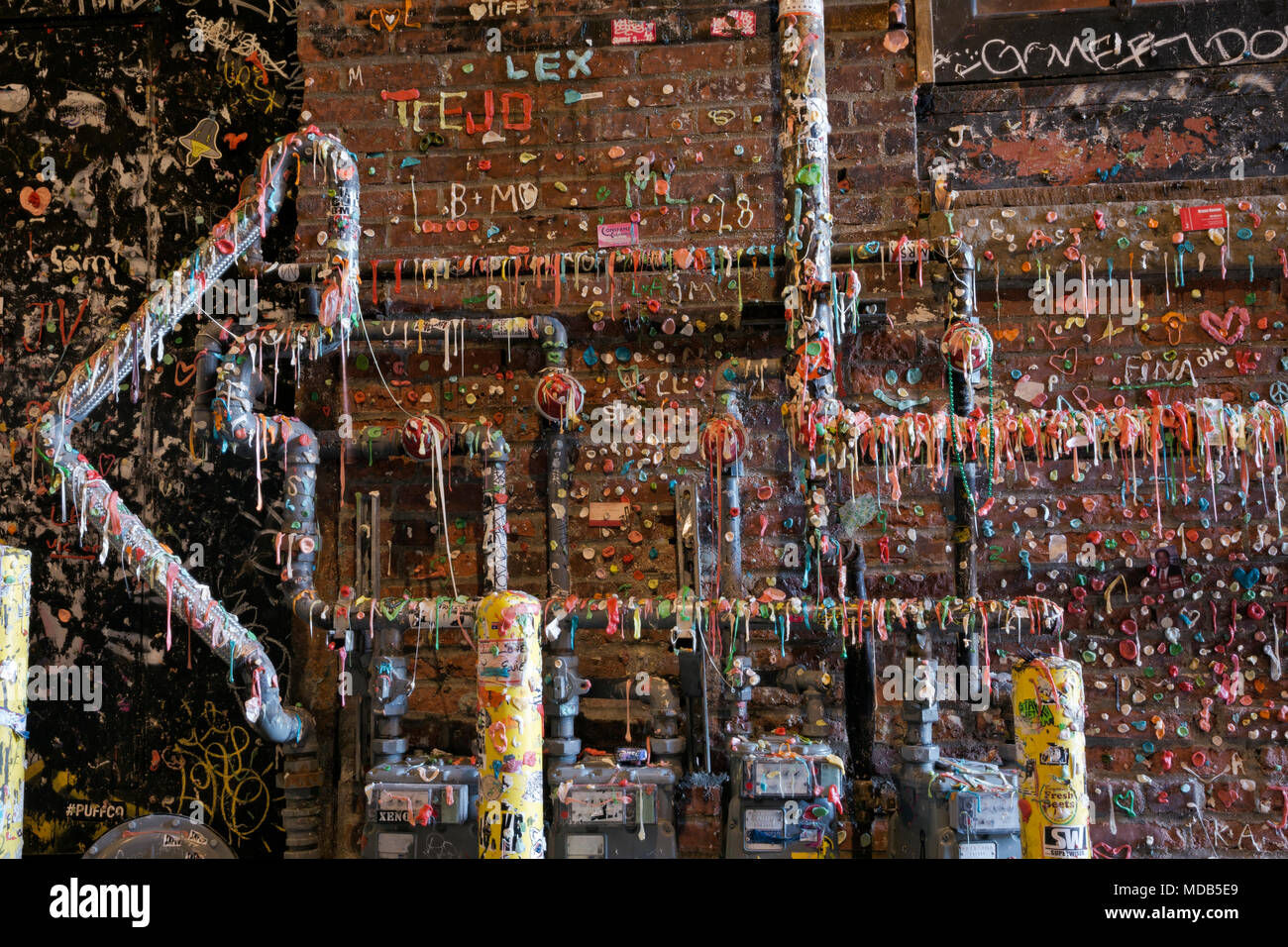 WA15280-00...WASHINGTON - Seattle's gum wall a couple weeks after a semi-annual cleaning, located in Post Alley, south of the Pike Place Market. Stock Photo