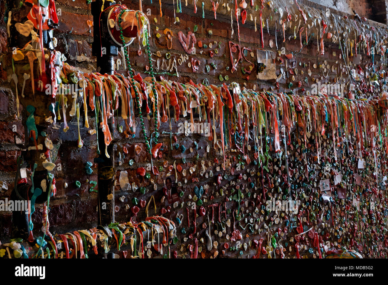 WA15281-00...WASHINGTON - Seattle's gum wall a couple weeks after a semi-annual cleaning, located in Post Alley, south of the Pike Place Market. Stock Photo