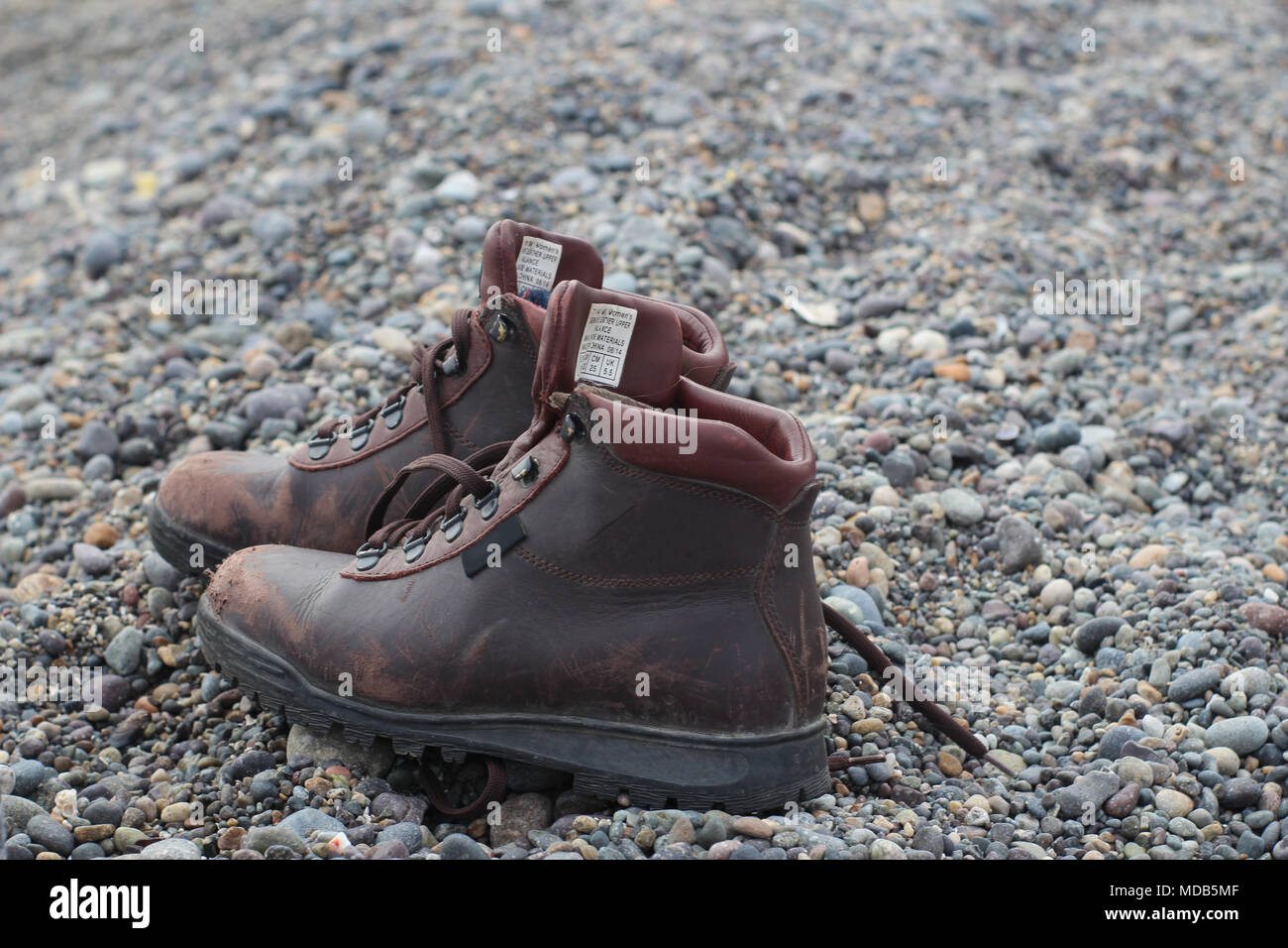 Leather Boots on the Beach Stock Photo Alamy