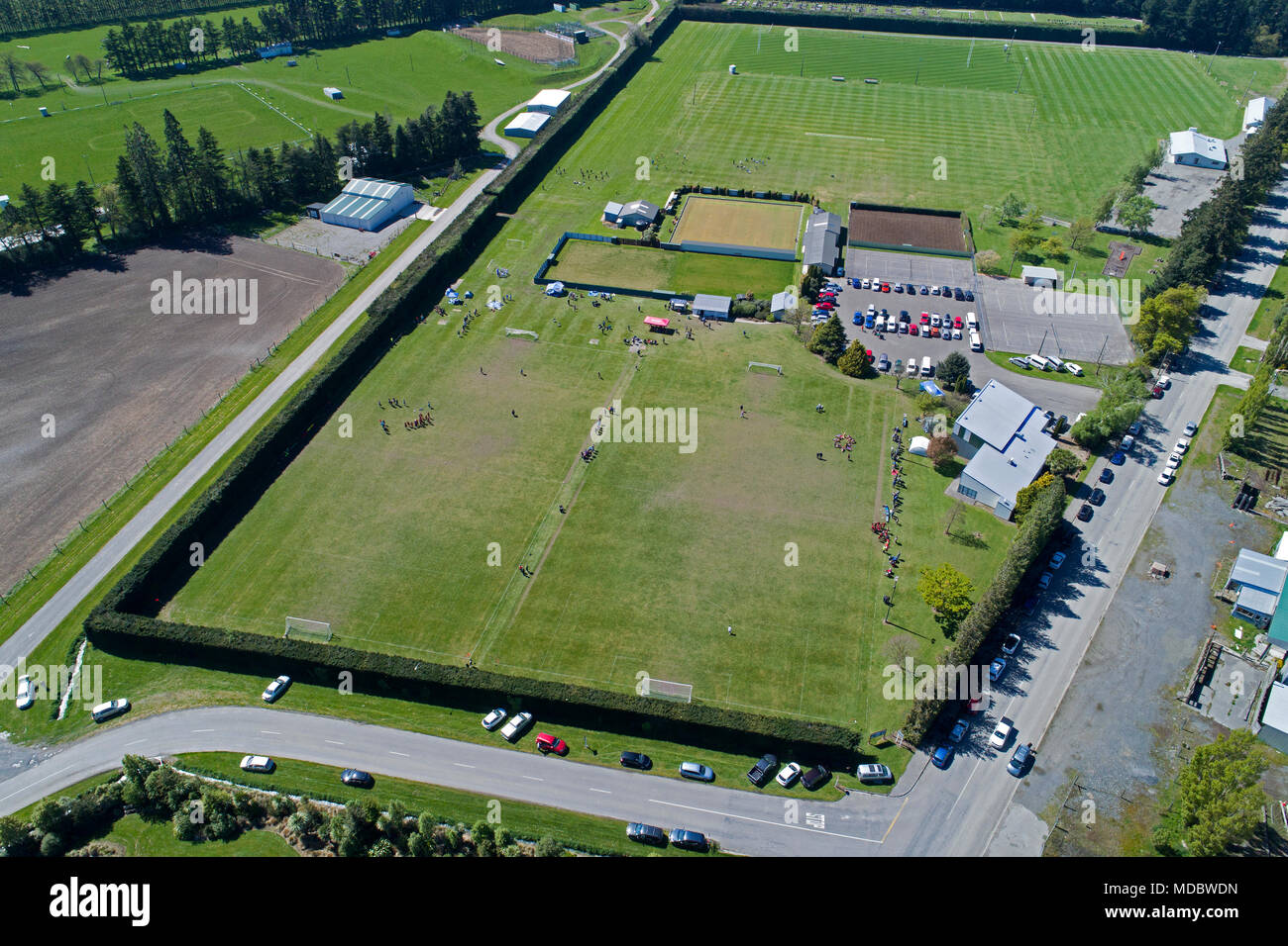 Girls South Island football tournament, Methven Recreational Reserve, Methven, Mid Canterbury, South Island, New Zealand - drone aerial Stock Photo