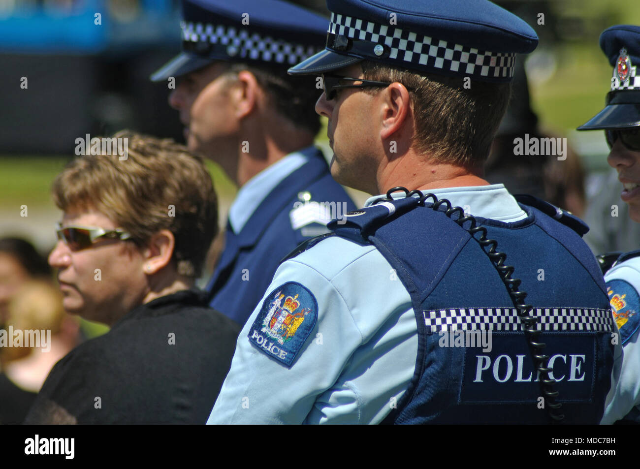 GREYMOUTH, NEW ZEALAND, DECEMBER 2, 2010: Police among the crowds at the Pike River Memorial Service, held in honour of the 29 men killed in the Pike RIver Mine near Greymouth, 2010 Stock Photo