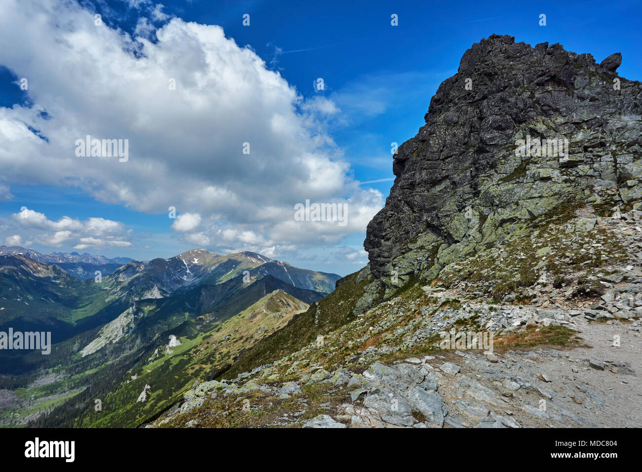 Rocky peaks and clouded sky in the Tatra Mountains in Poland Stock ...