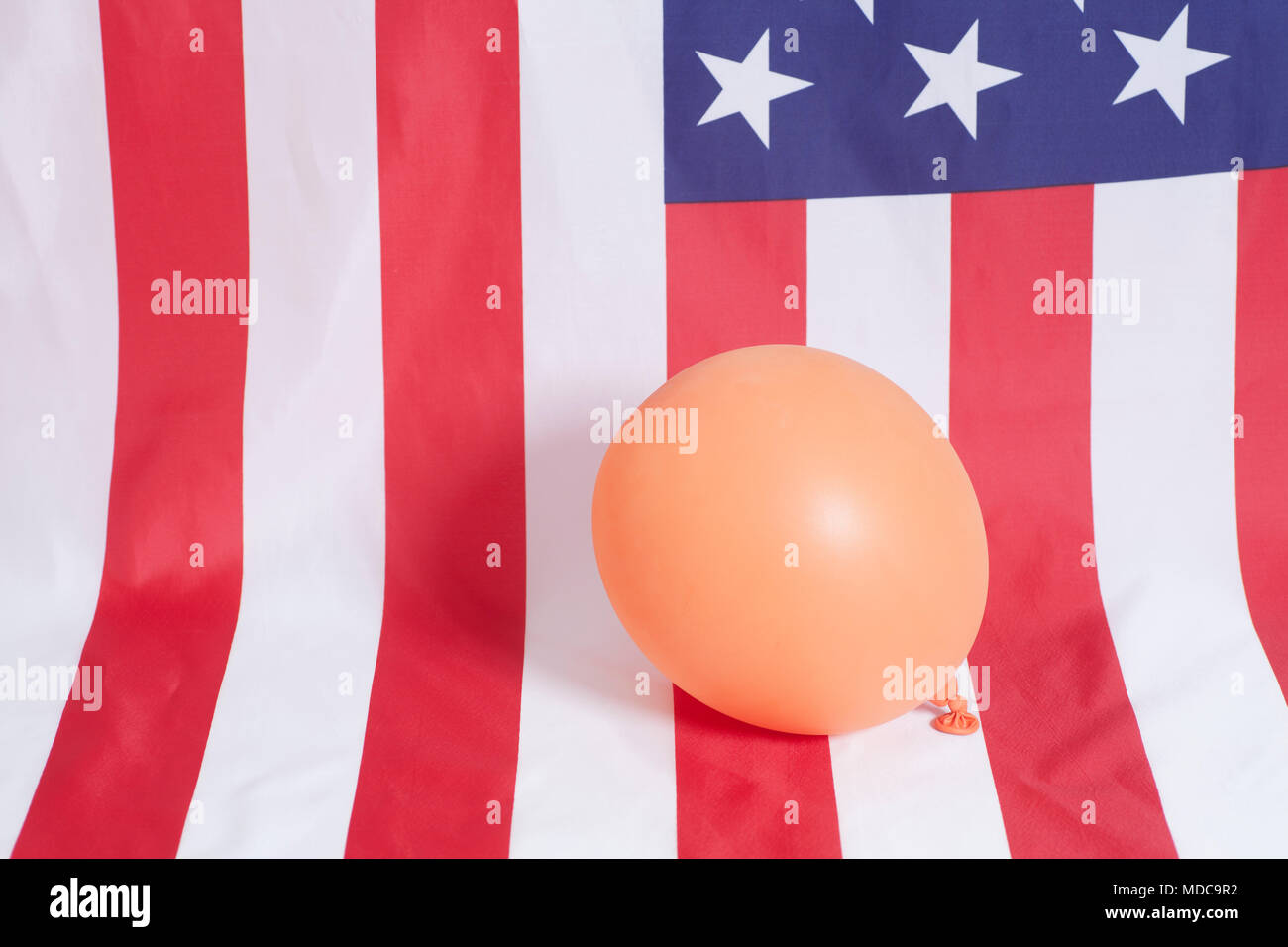 Inflatable balloon on american flag background close up Stock Photo