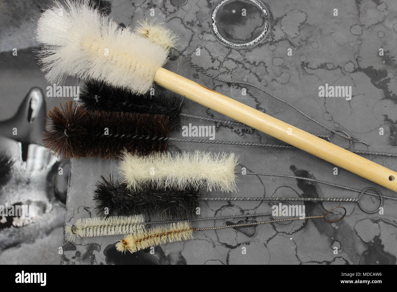 Glassware brushes by laboratory sink Stock Photo Alamy