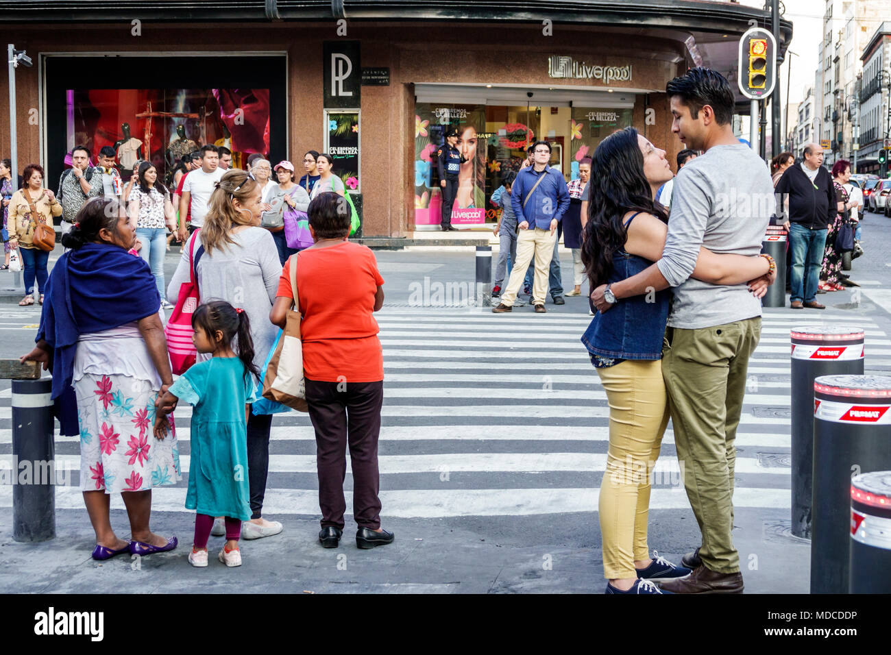 Mexico City,Mexican,Hispanic,historic Center Centre,intersection,busy,pedestrians,street crossing,man men male,woman female women,girl girls,kid kids Stock Photo