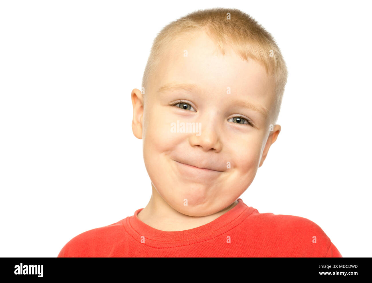 Happy young boy with smile on his face on white Stock Photo