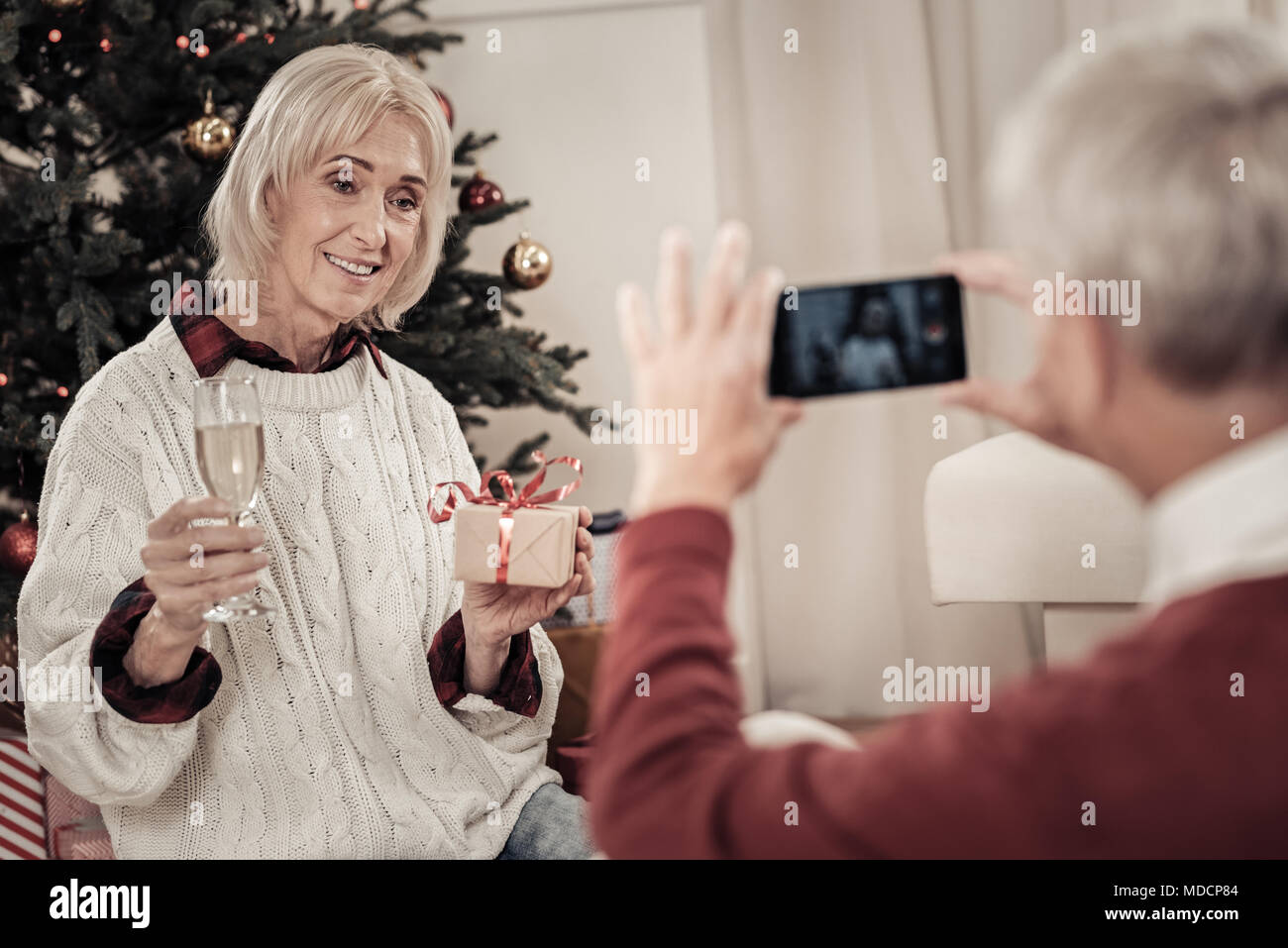Pretty mature woman posing on camera Stock Photo