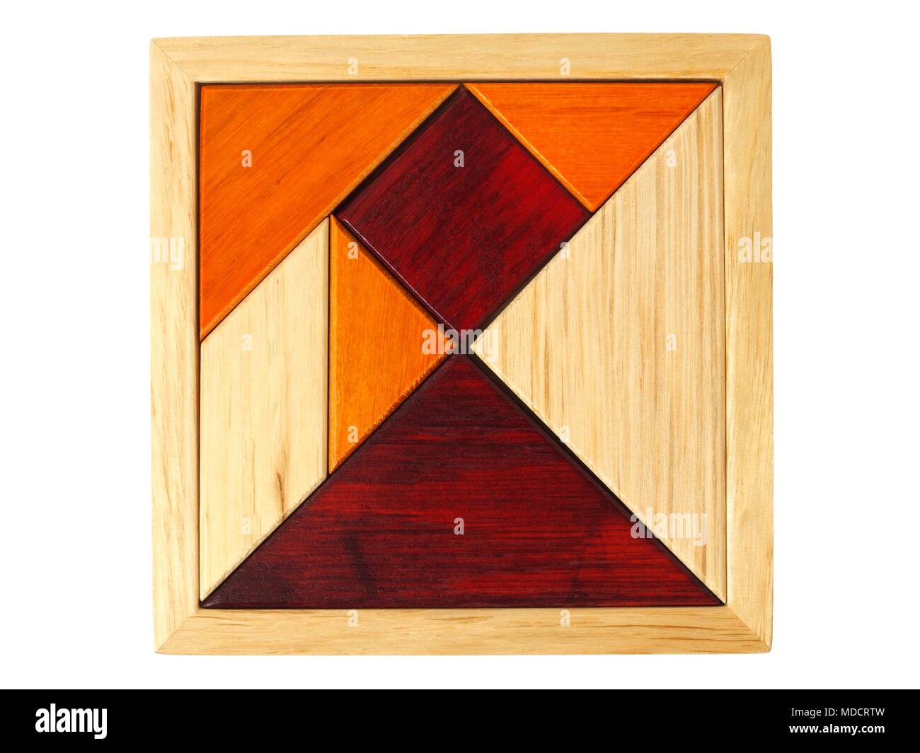 Square shape made from tangram in a wooden box Stock Photo