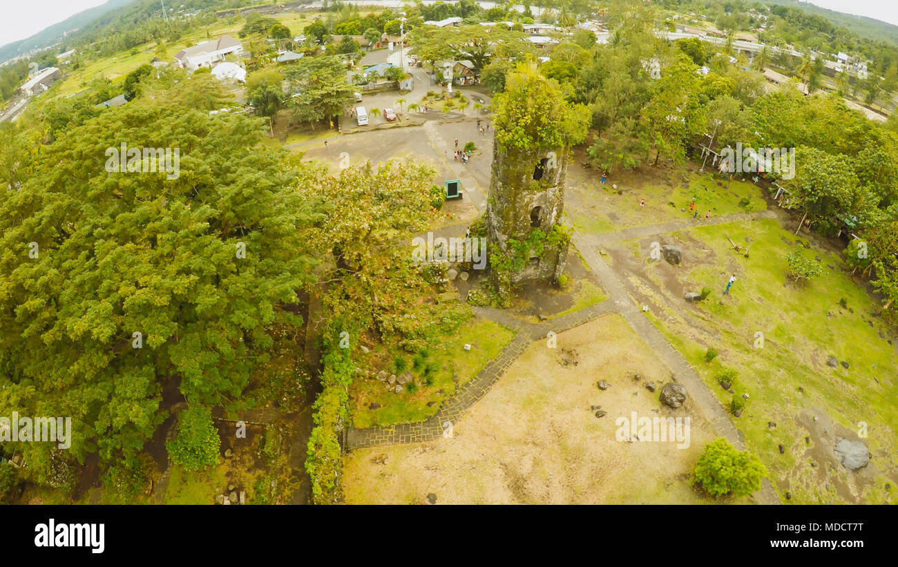 Aerial views the ruins of Cagsawa church, showing Mount Mayon erupting in the background. Cagsawa church. Philippines. Stock Photo
