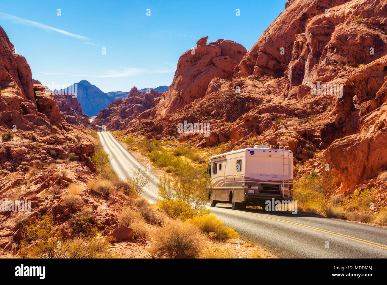 Motorhome trailer traveling on the road in Valley of Fire Stock Photo