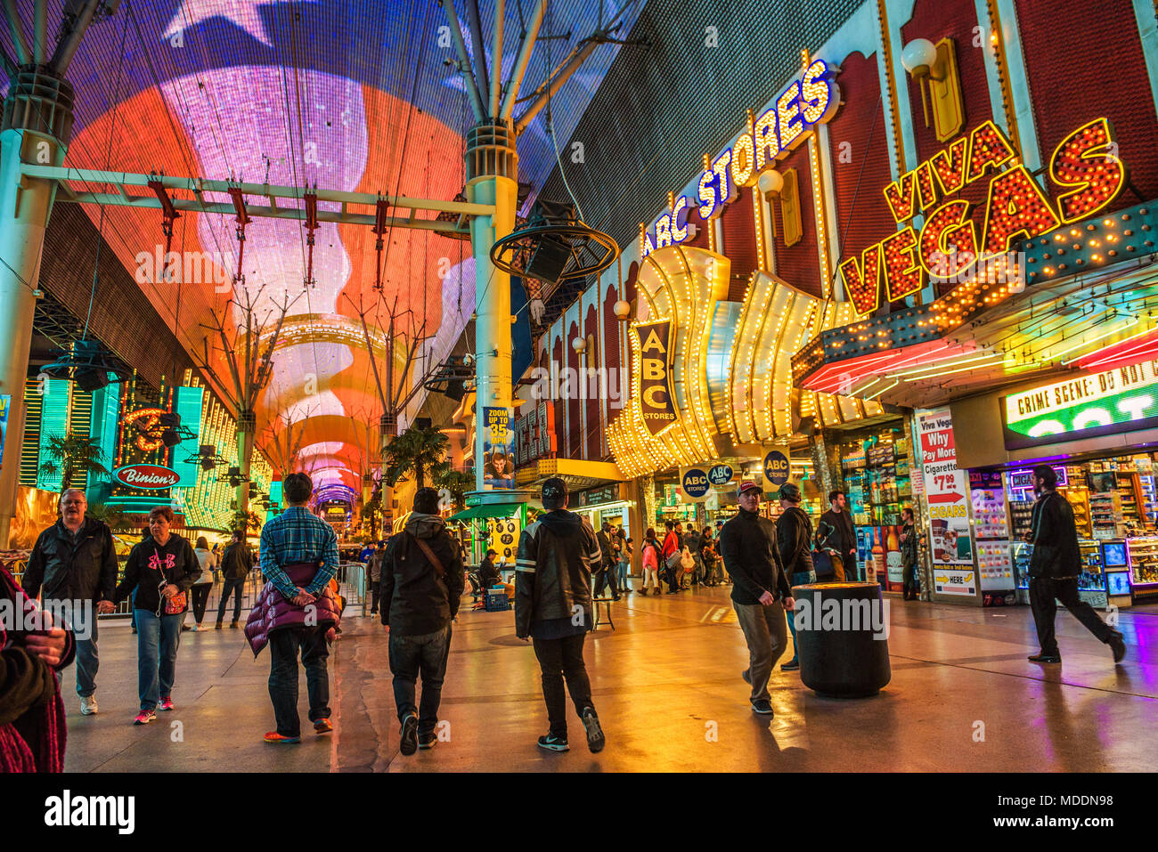 Fremont Street with many neon lights and tourists in Las Vegas Stock Photo