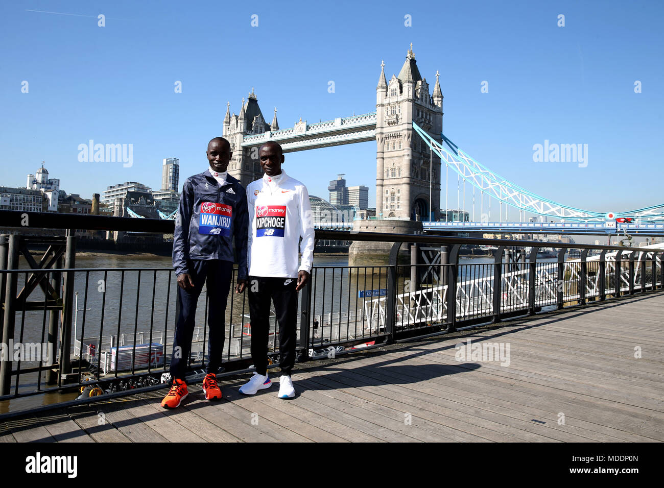 Kenya's Daniel Wanjiru (left) and Eliud Kipchoge pose for a picture in front of Tower Bridge during the media day at the Tower Hotel, London. PRESS ASSOCIATION Photo. Picture date: Thursday April 19, 2018. See PA story ATHLETICS Marathon. Photo credit should read: Steven Paston/PA Wire Stock Photo