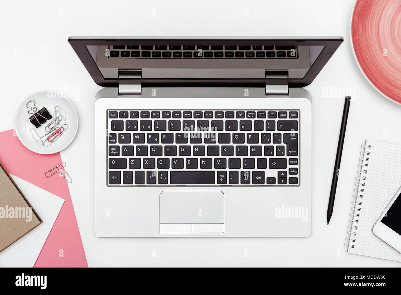 Feminine business desk from above on white background. Flat lay Stock Photo