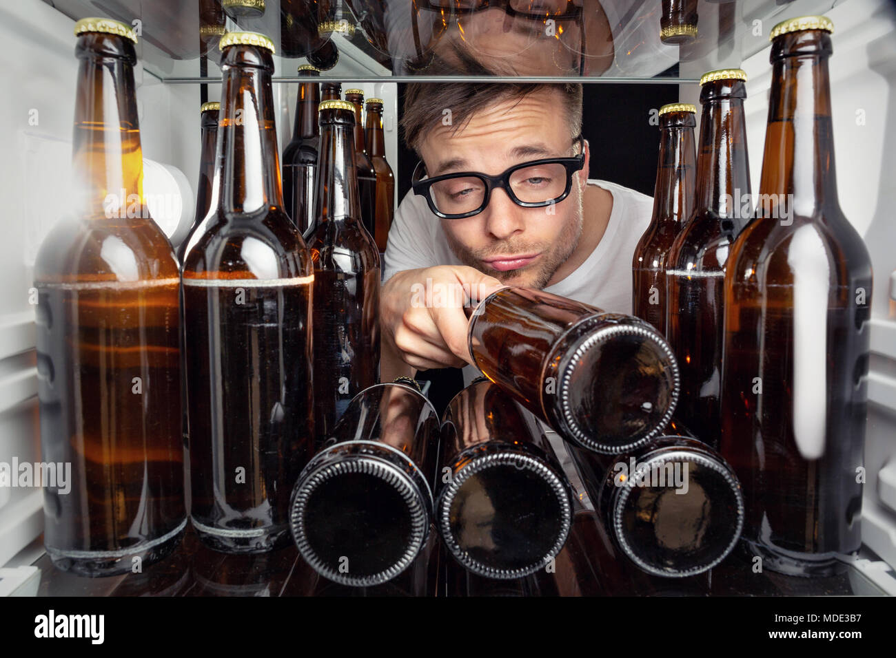 Fridge full of beer bottles Stock Photo Alamy
