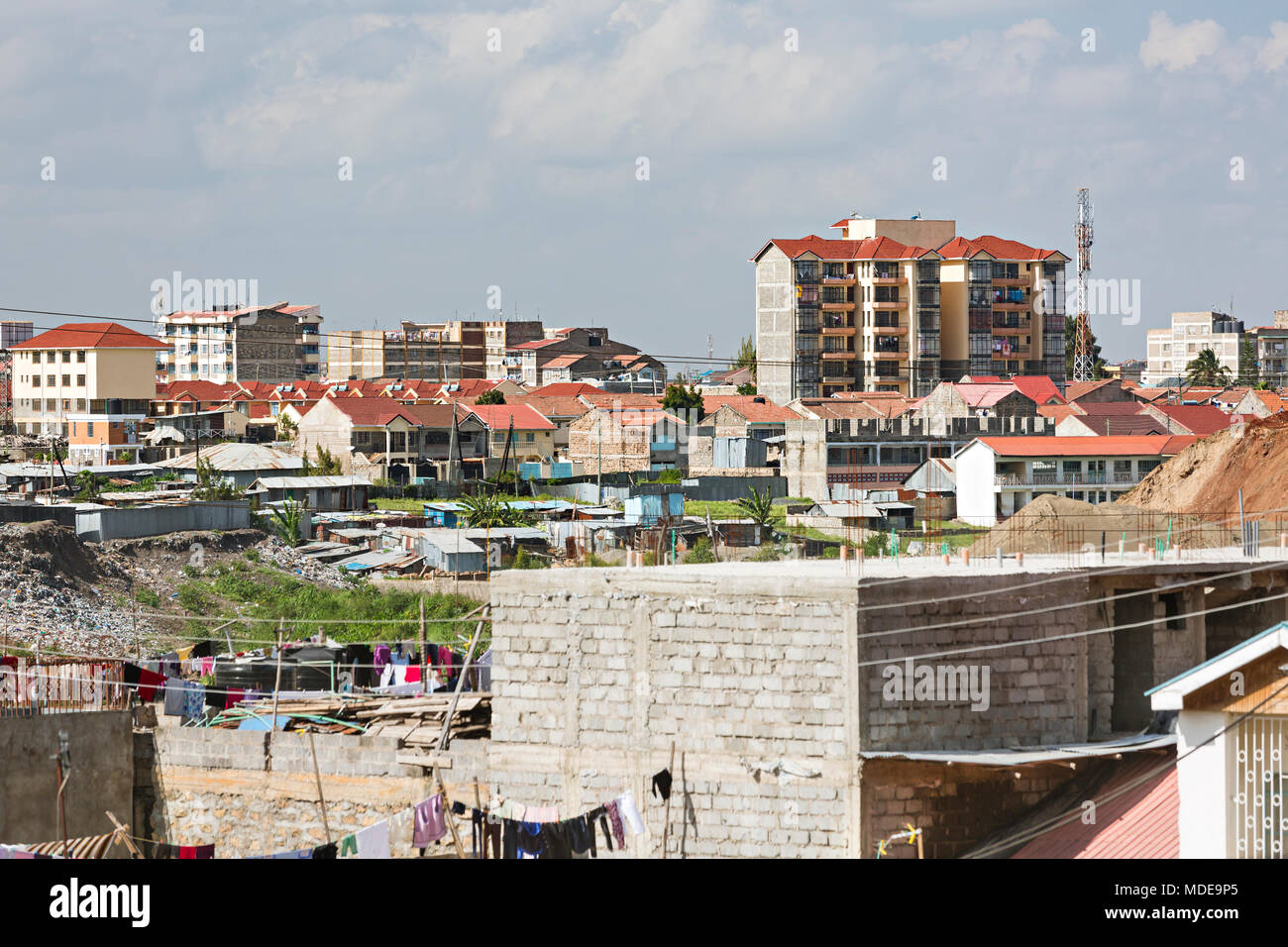 View from Tassia over Ngong River and a slum and garbage dump to Donholm in the southeast of Nairobi, Kenya. Stock Photo