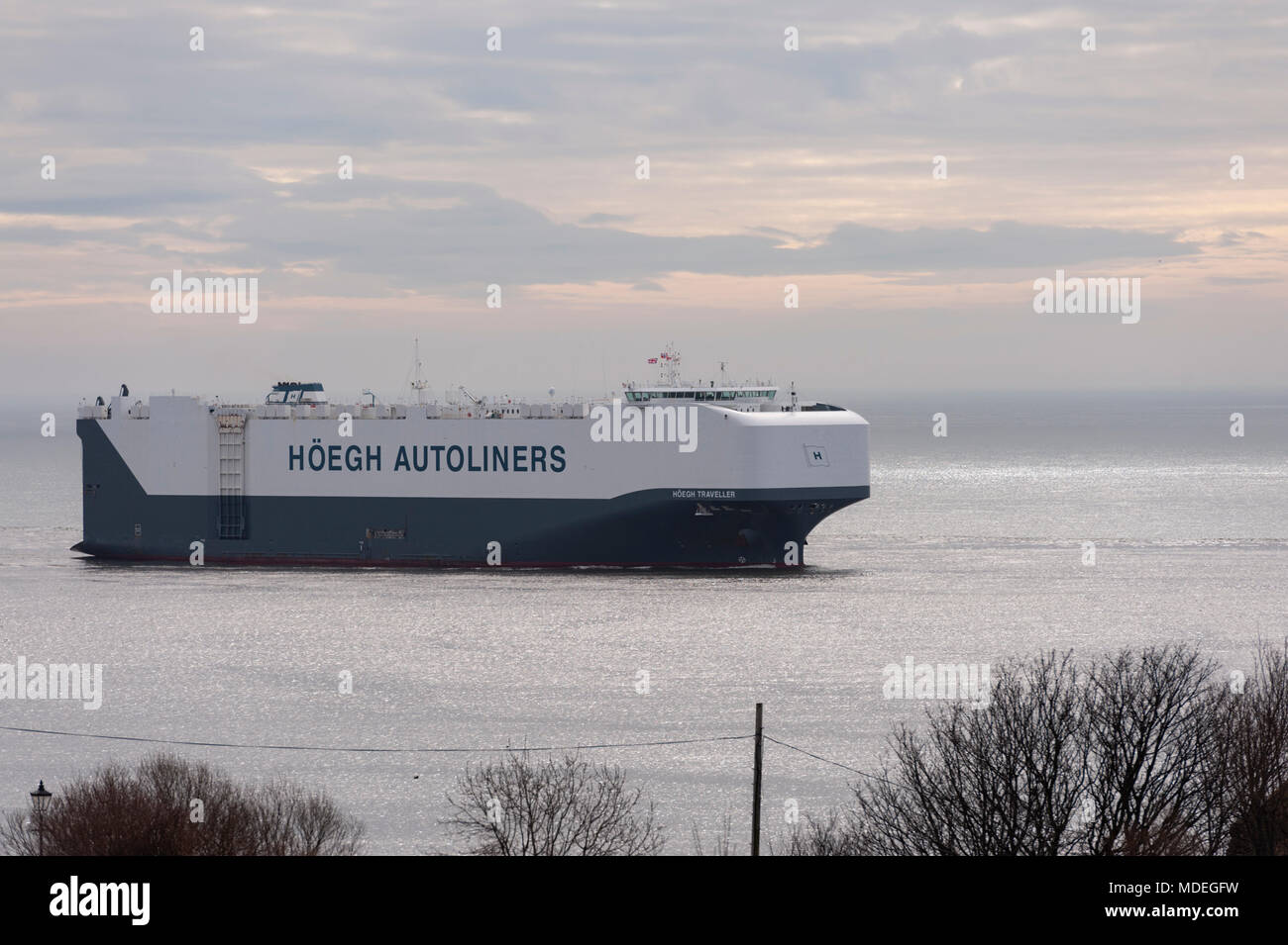 The Hoegh Traveller the autoliner arriving in the river Tyne on the early morning low tide, on the North East Coast. Stock Photo