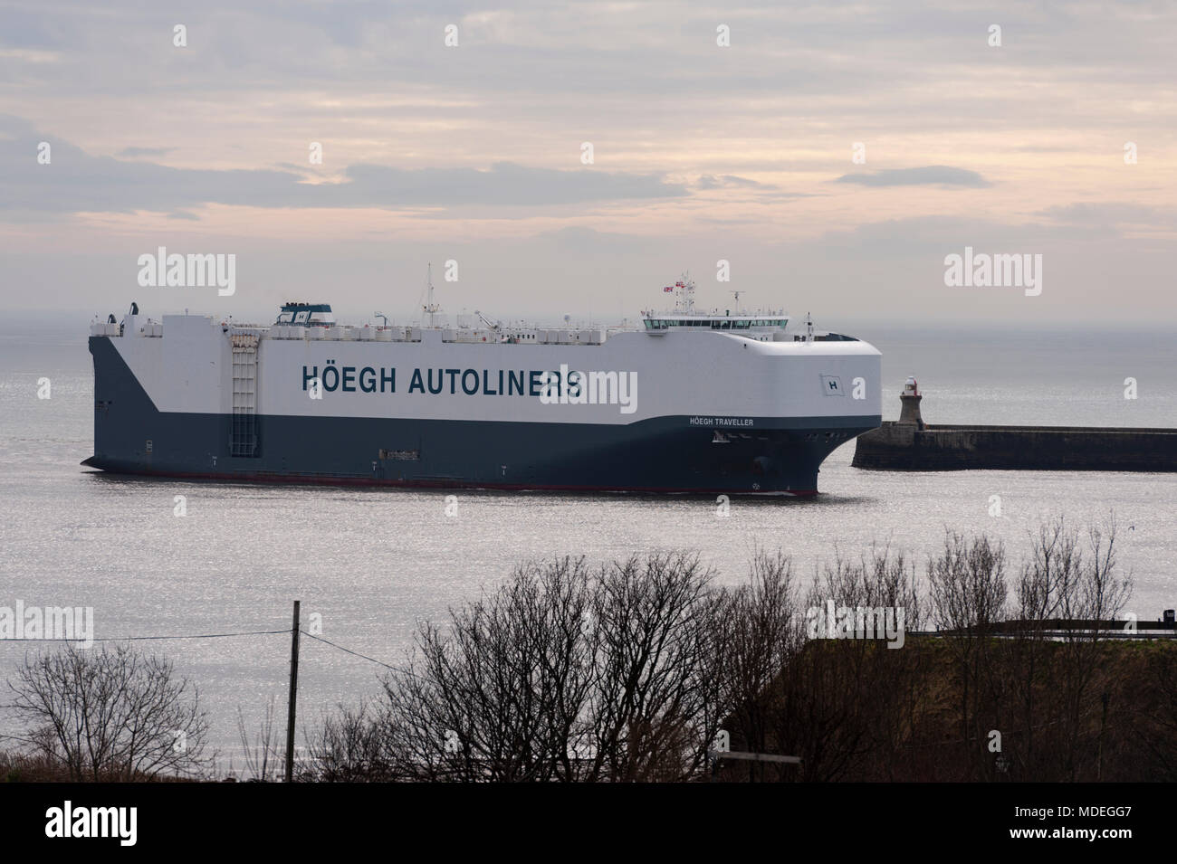 The Hoegh Traveller the autoliner arriving in the river Tyne on the early morning low tide, on the North East Coast. Stock Photo