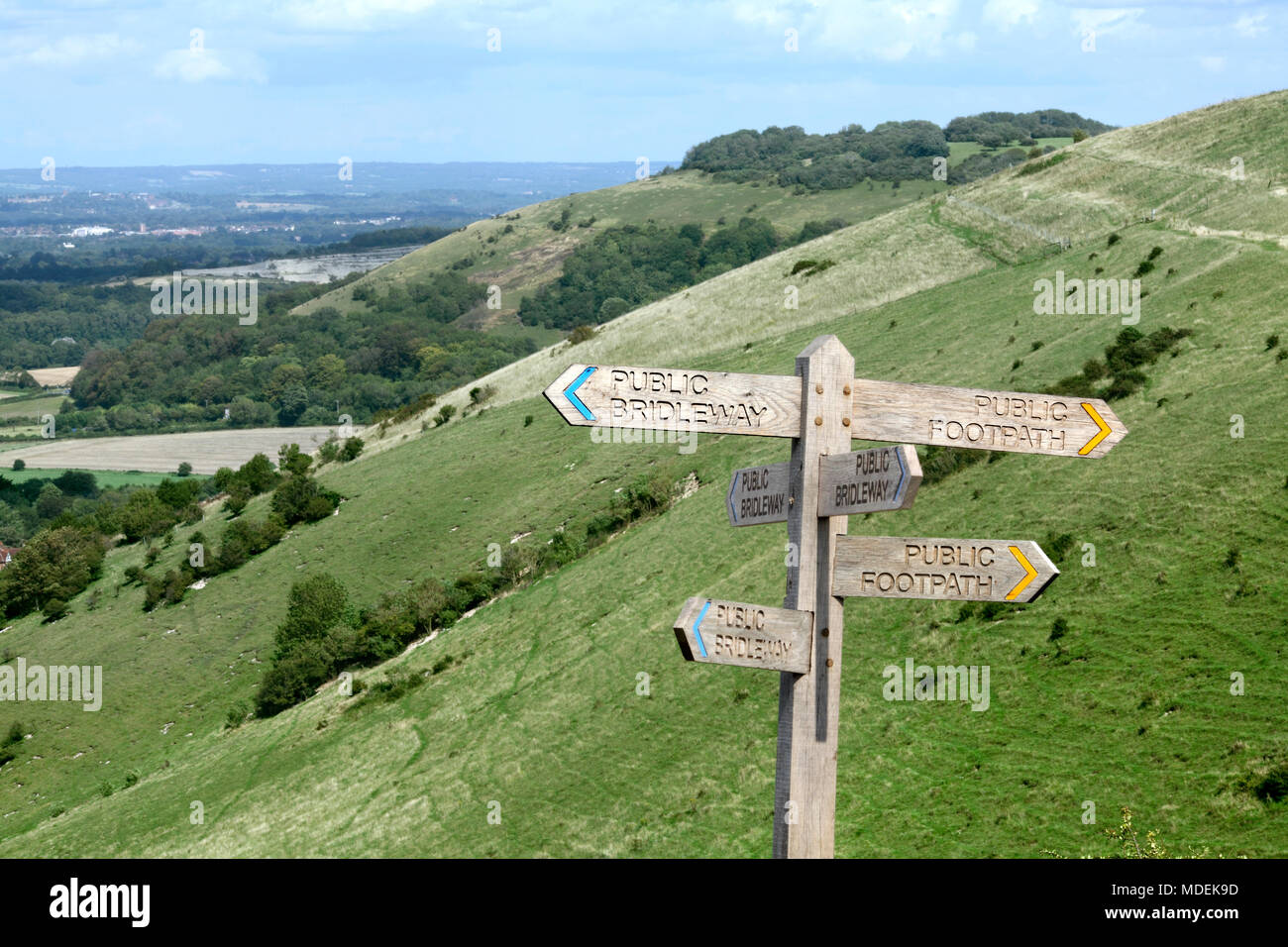 A new(ish) sign post on the South Downs indicating public footpaths and bridleways branching out in six directions, on Fulking Hill near Brighton. Stock Photo