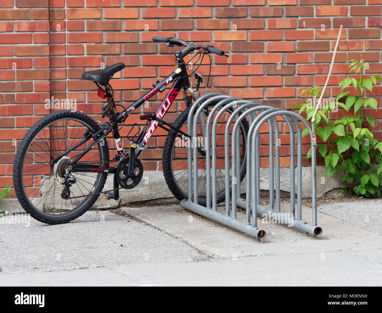 Quebec,Canada. Bike parked in bicycle rack Stock Photo Alamy