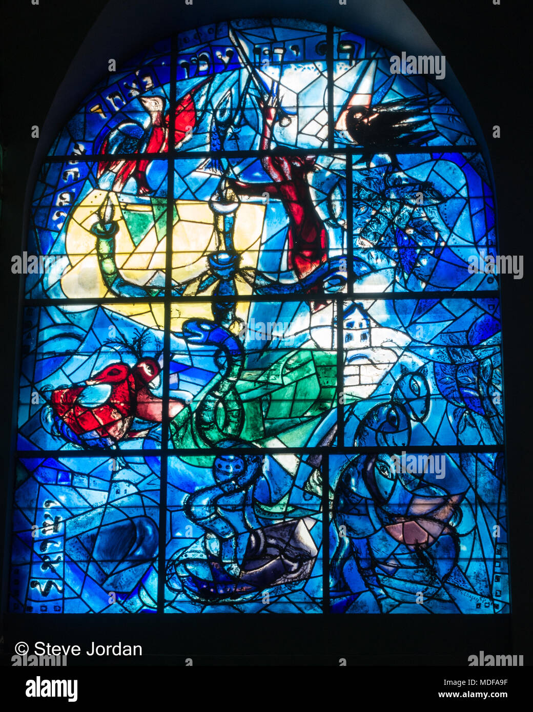 Stained Glass by Chagall representing the Tribe of Dan at Hadassah Hospital in Jerusalem Stock Photo