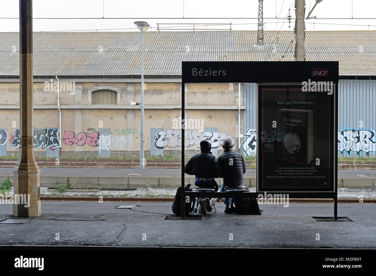 Passengers waiting at Beziers train station in France Stock Photo