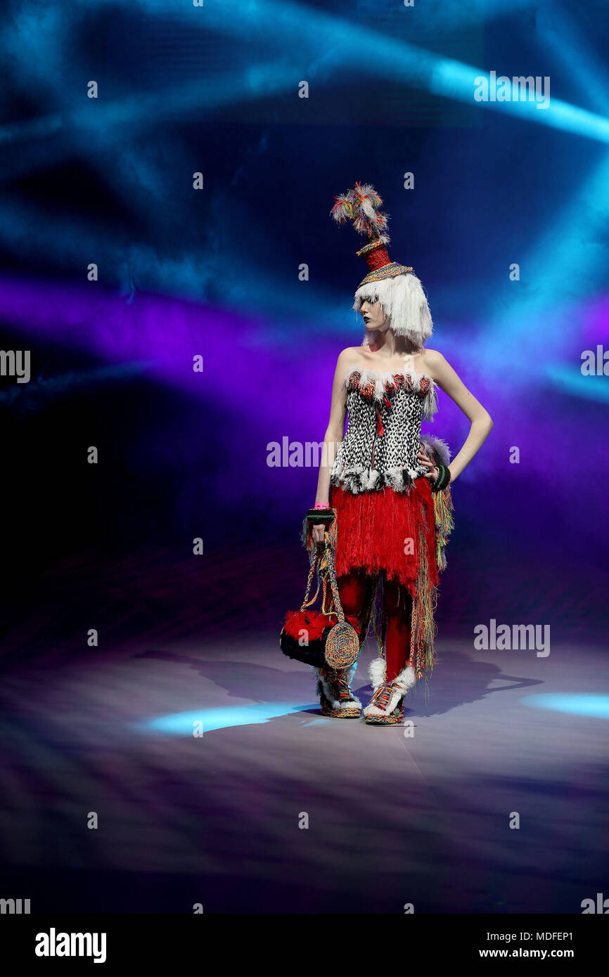A model wears a creation called 'Shoelace Showcase' as the Bank of Ireland Junk Kouture finalists took to the catwalk at the 3Arena in Dublin during a full dress rehearsal of their creations fashioned from recycled materials. Stock Photo