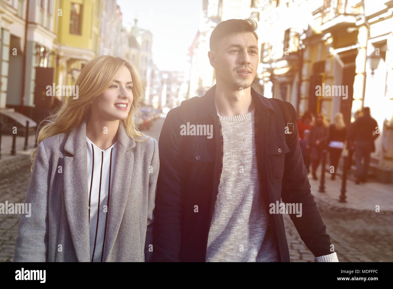 Beautiful couple walking at street Stock Photo