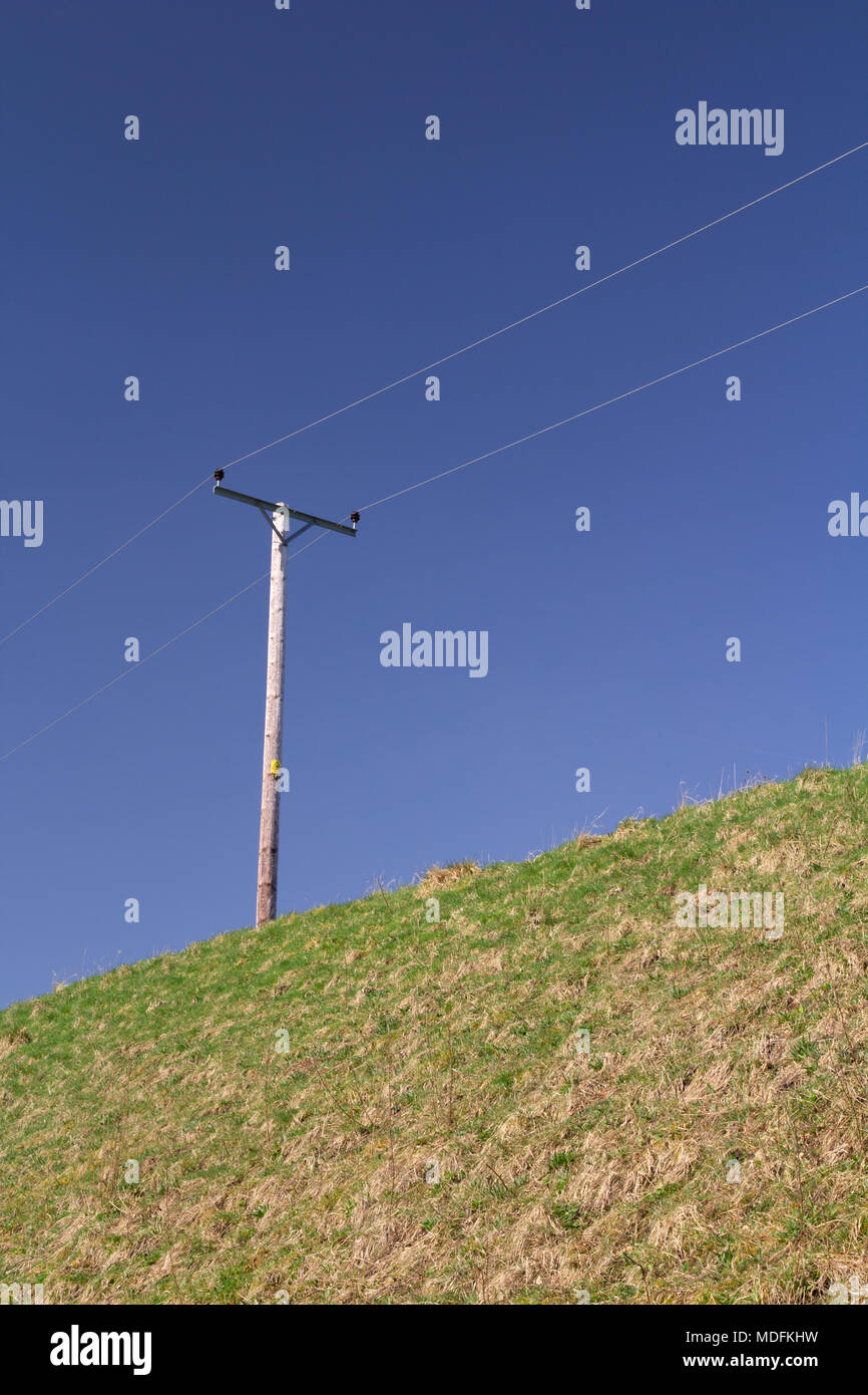 Electric pole & blue sky Stock Photo - Alamy