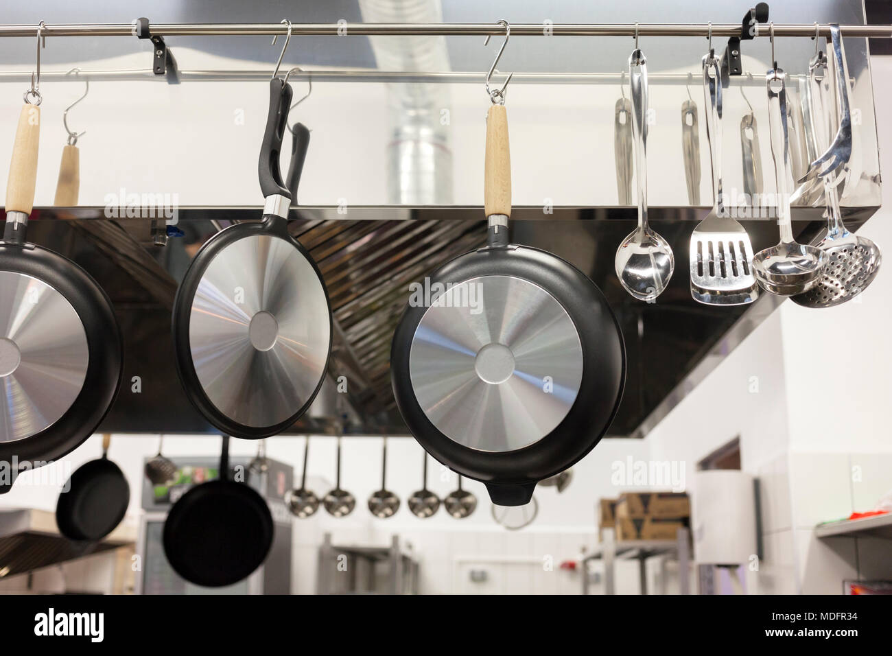 Hanging pans in kitchen hires stock photography and images Alamy