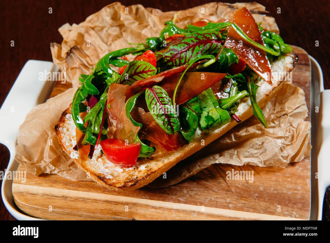 Prosciutto and salad ciabatta sandwich Stock Photo Alamy