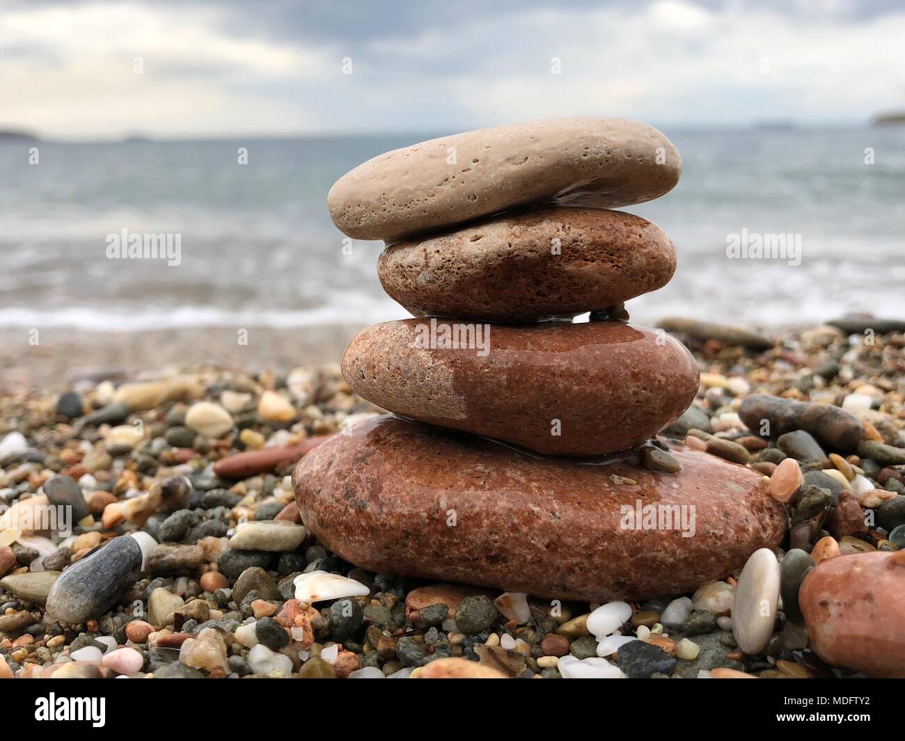 Stack of pebbles on the beach Stock Photo