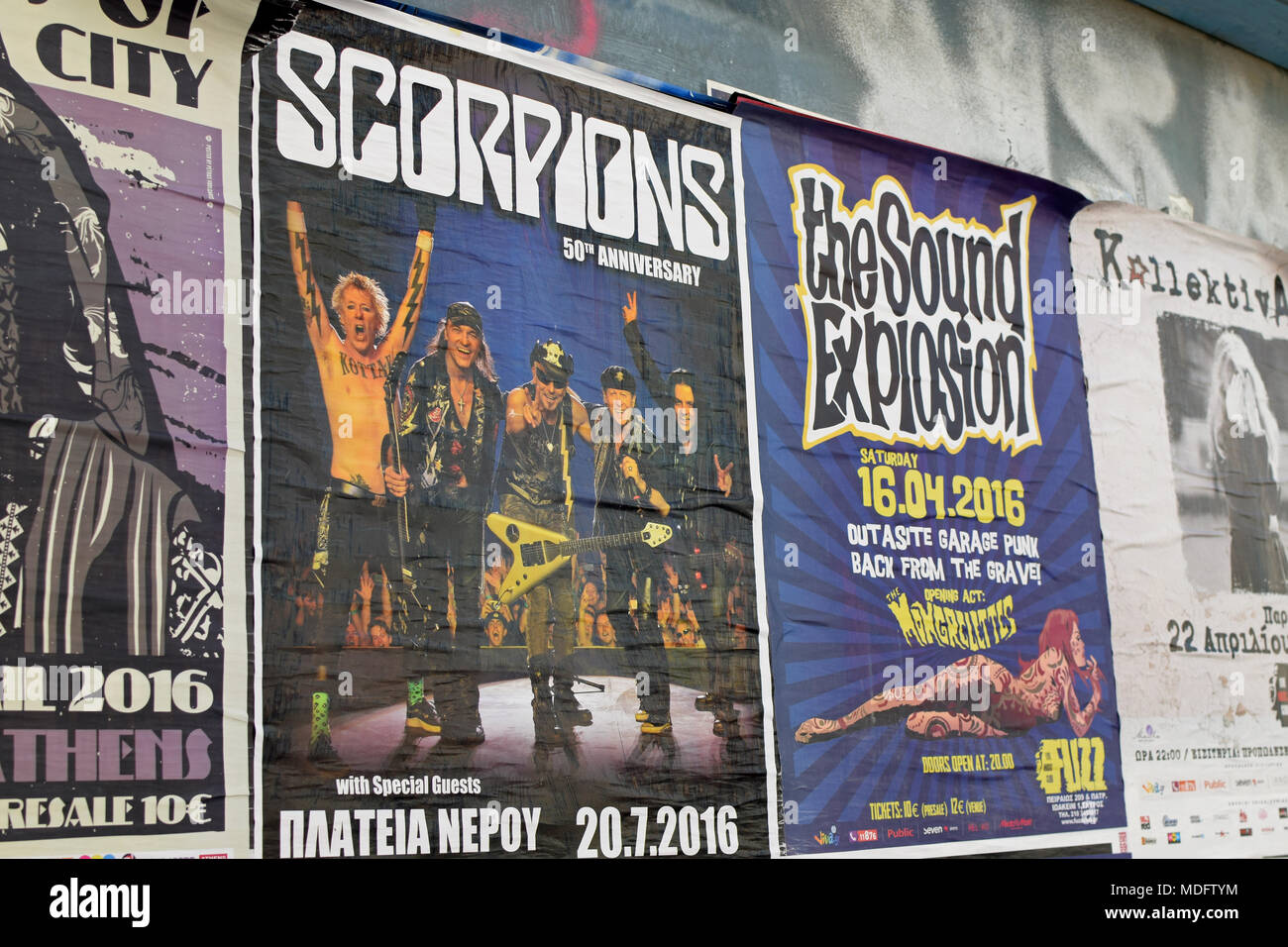 ATHENS, GREECE - APRIL 9, 2016: Wall with concert posters live hard rock music by the Scorpions and garage punk by the Sound Explosion and Mongrelette Stock Photo