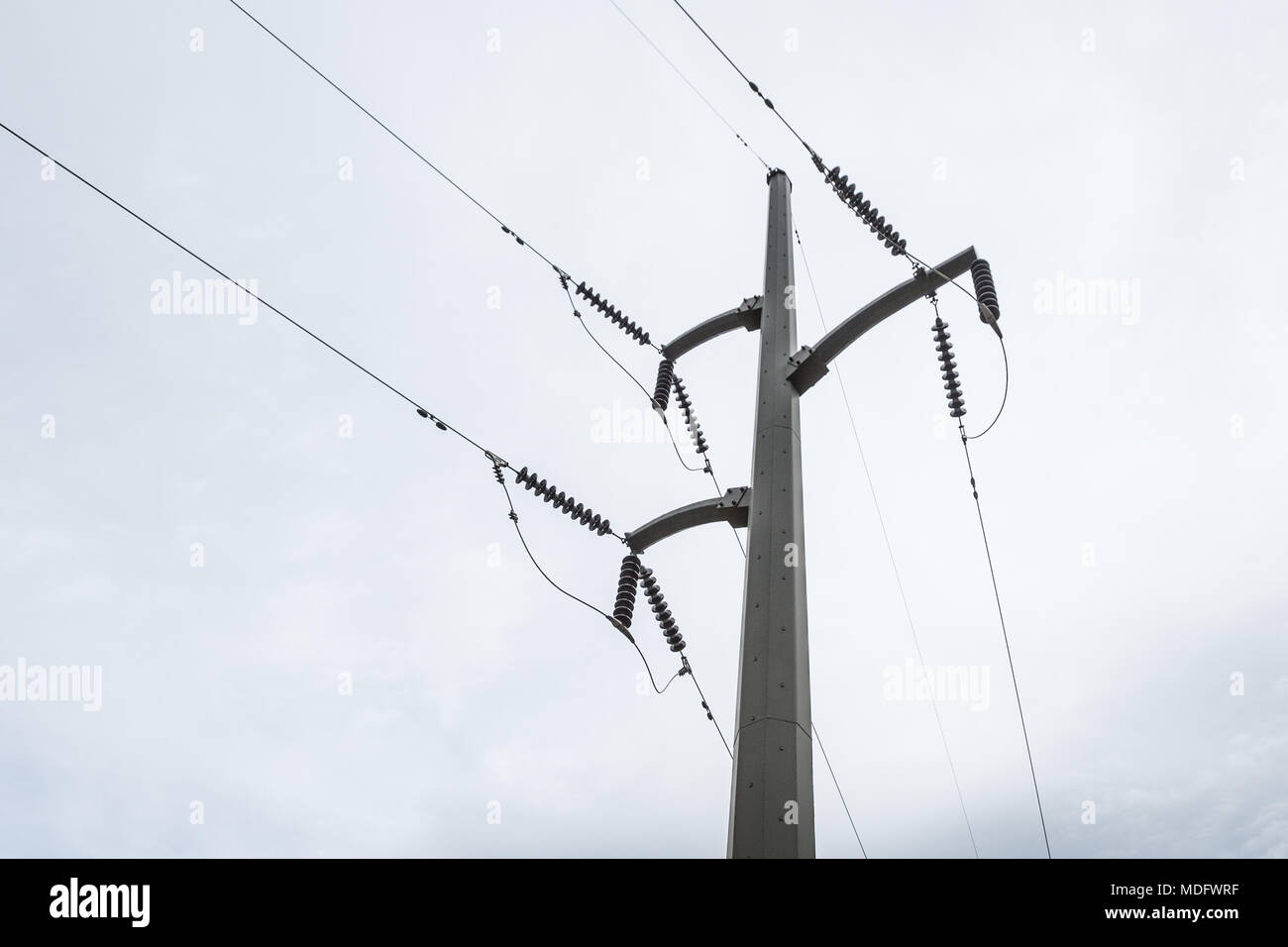 Low angle view of Electrical power lines Stock Photo