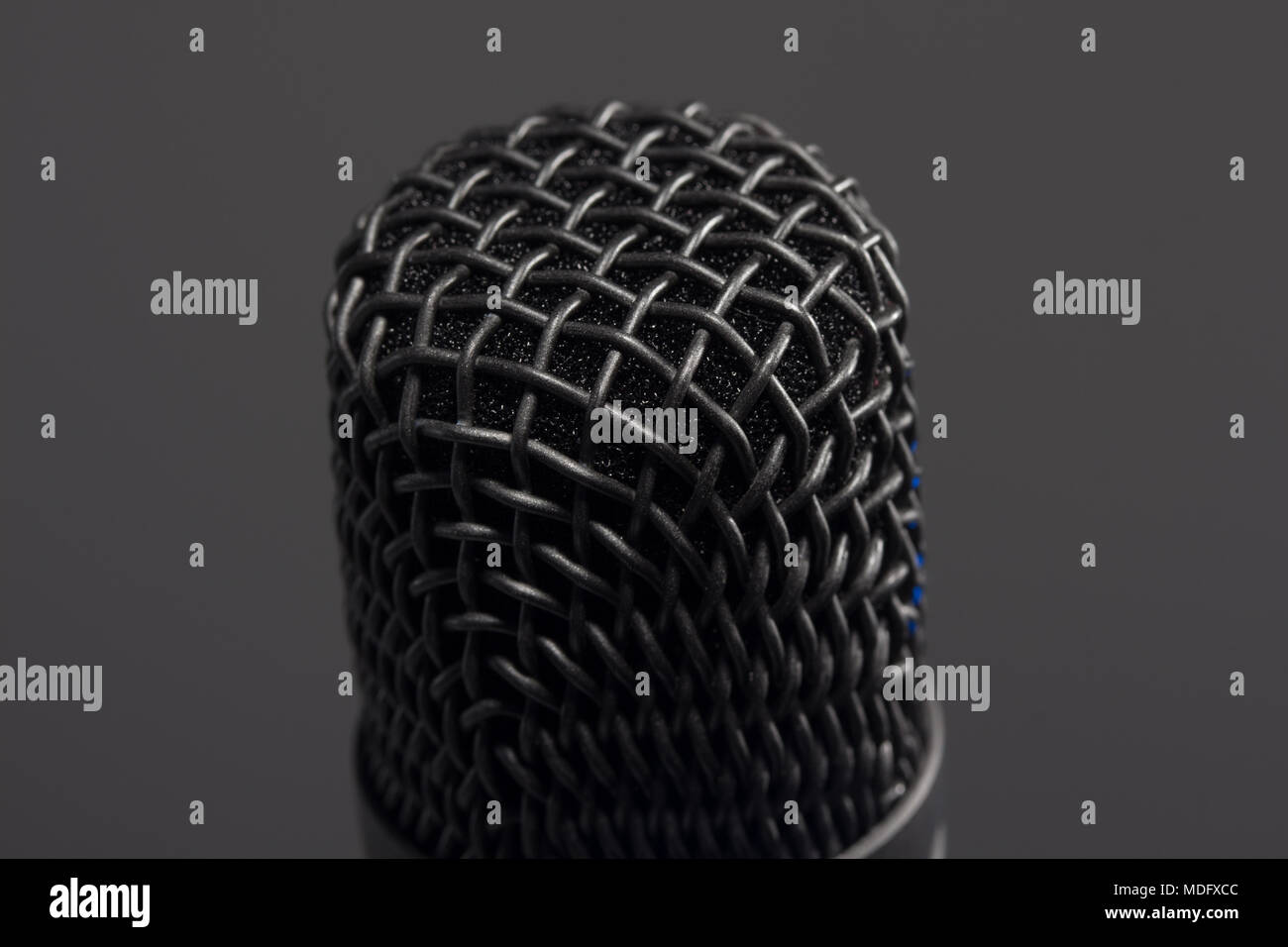 Black microphone grey background Stock Photo Alamy