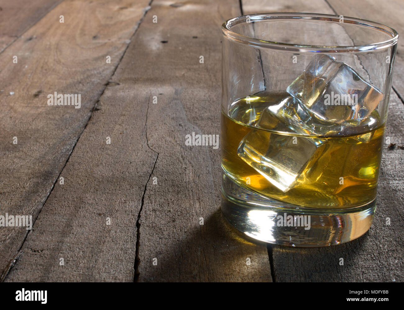 Whiskey with an Ice Ball in a Glass. Stock Photo - Image of lounge, dark:  173206876