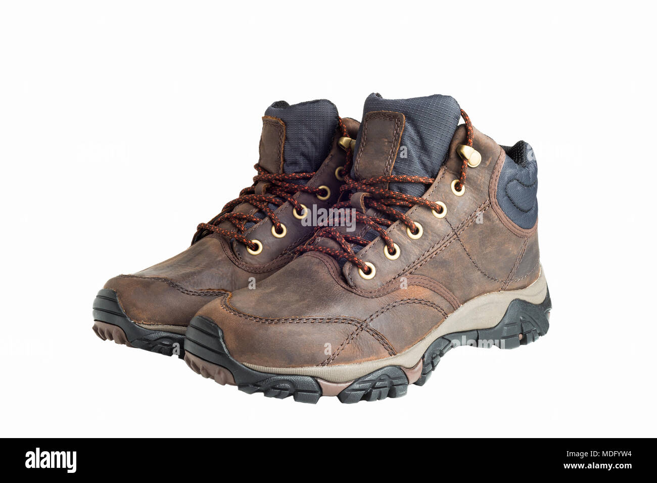 Pair of new hiking boots isolated on white background Stock Photo - Alamy